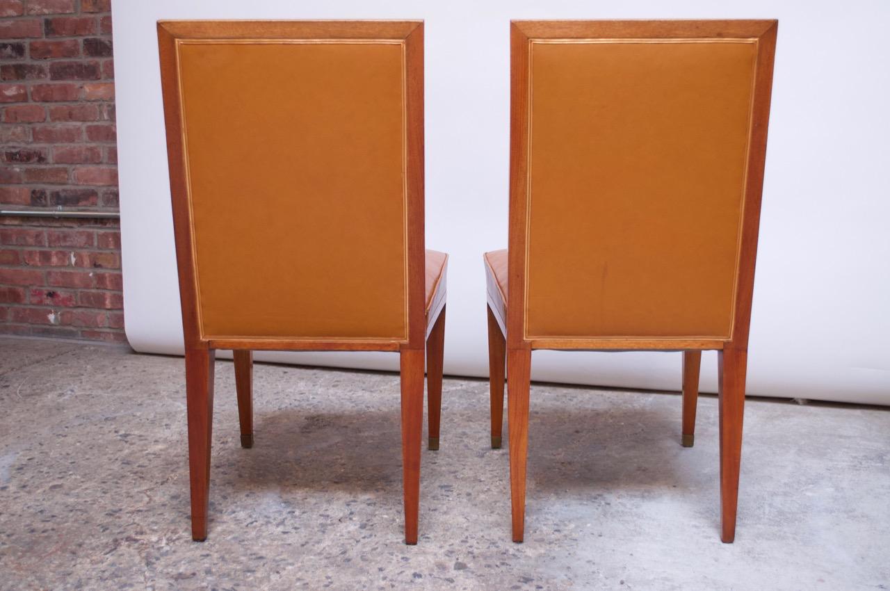 Mid-20th Century Pair of Jacques Quinet Occasional Chairs in Leather and Mahogany