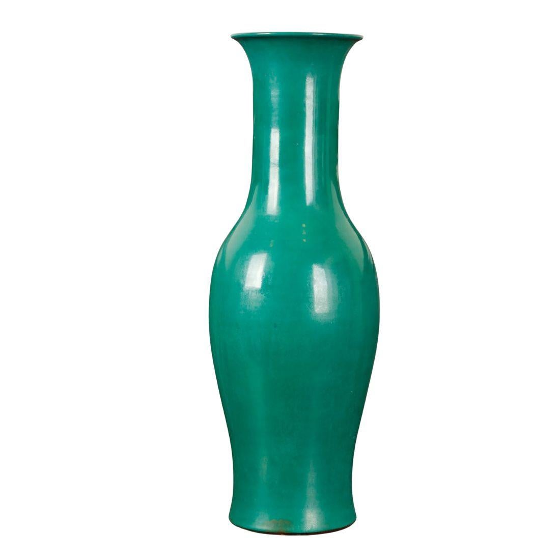 This stunning pair of vibrant green Kutani porcelain vases captures the essence of Japanese artistry. Kutani ware is a renowned style of Japanese porcelain, known for its vibrant, colorful overglaze enamel. The rich, glossy green glaze and smooth