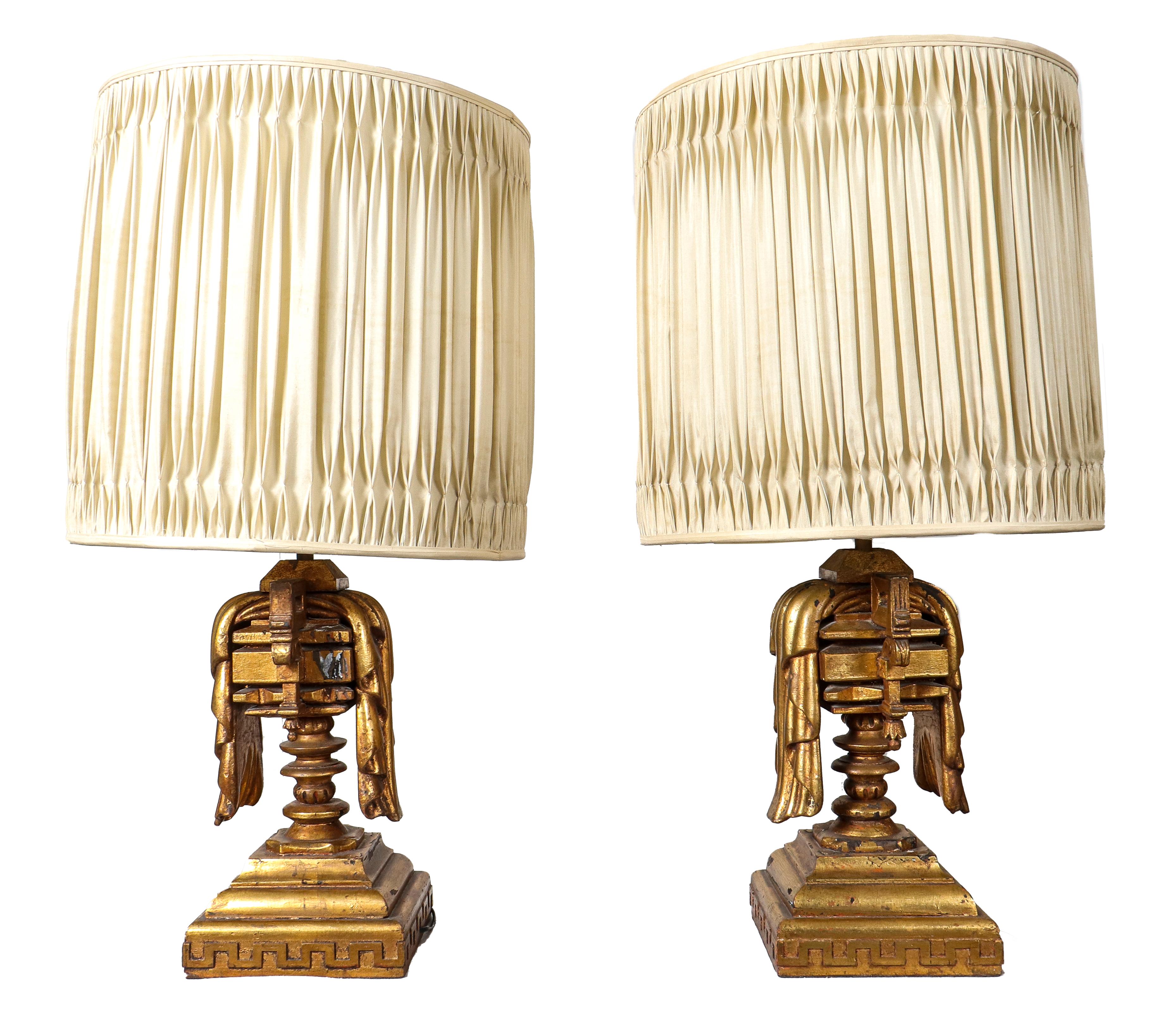 James Mont Mid-Century Modern carved giltwood table lamps, designed circa 1960, composed of older elements.