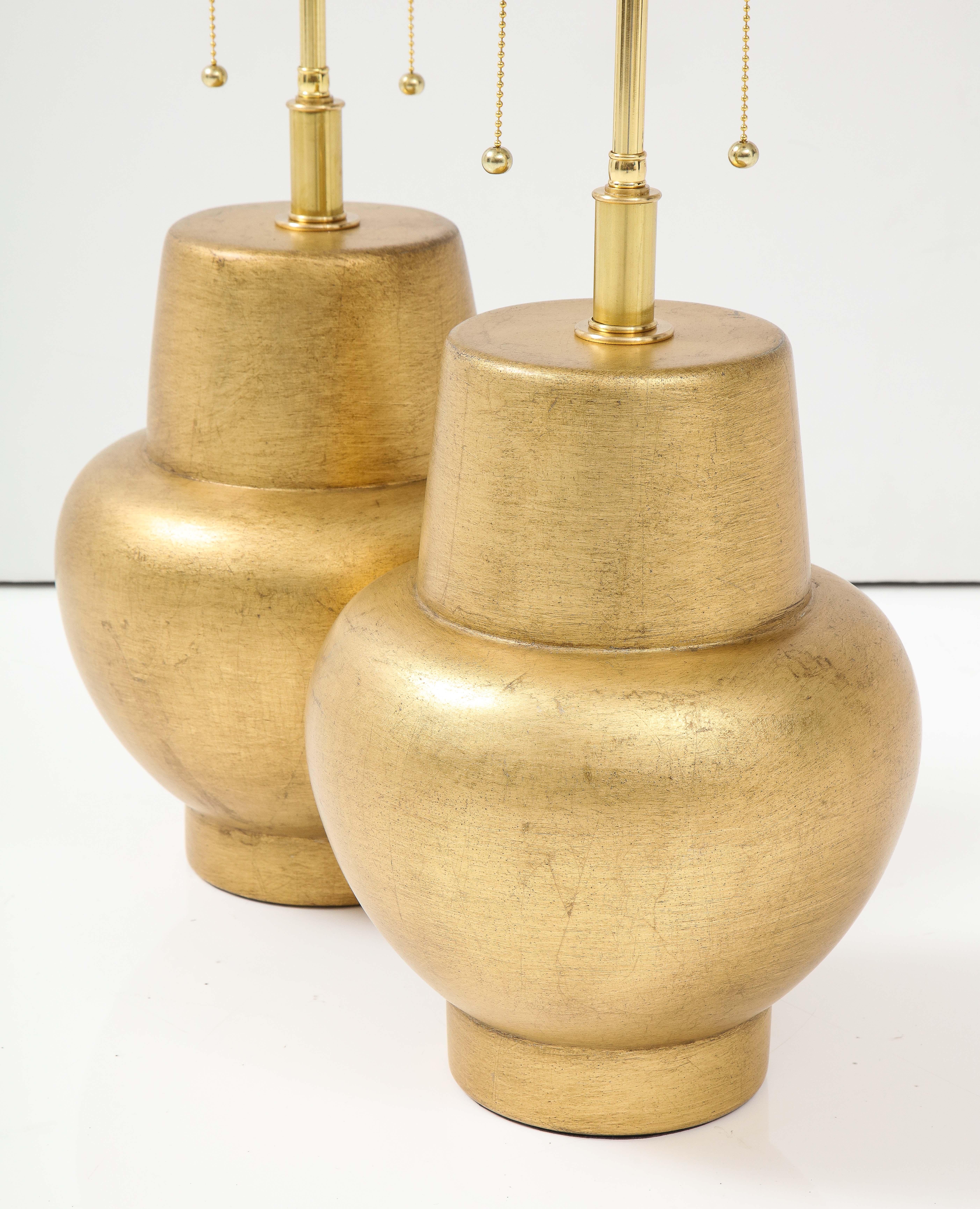 Wood Pair of JAMES MONT Design Gilt Leafed Lamps For Sale