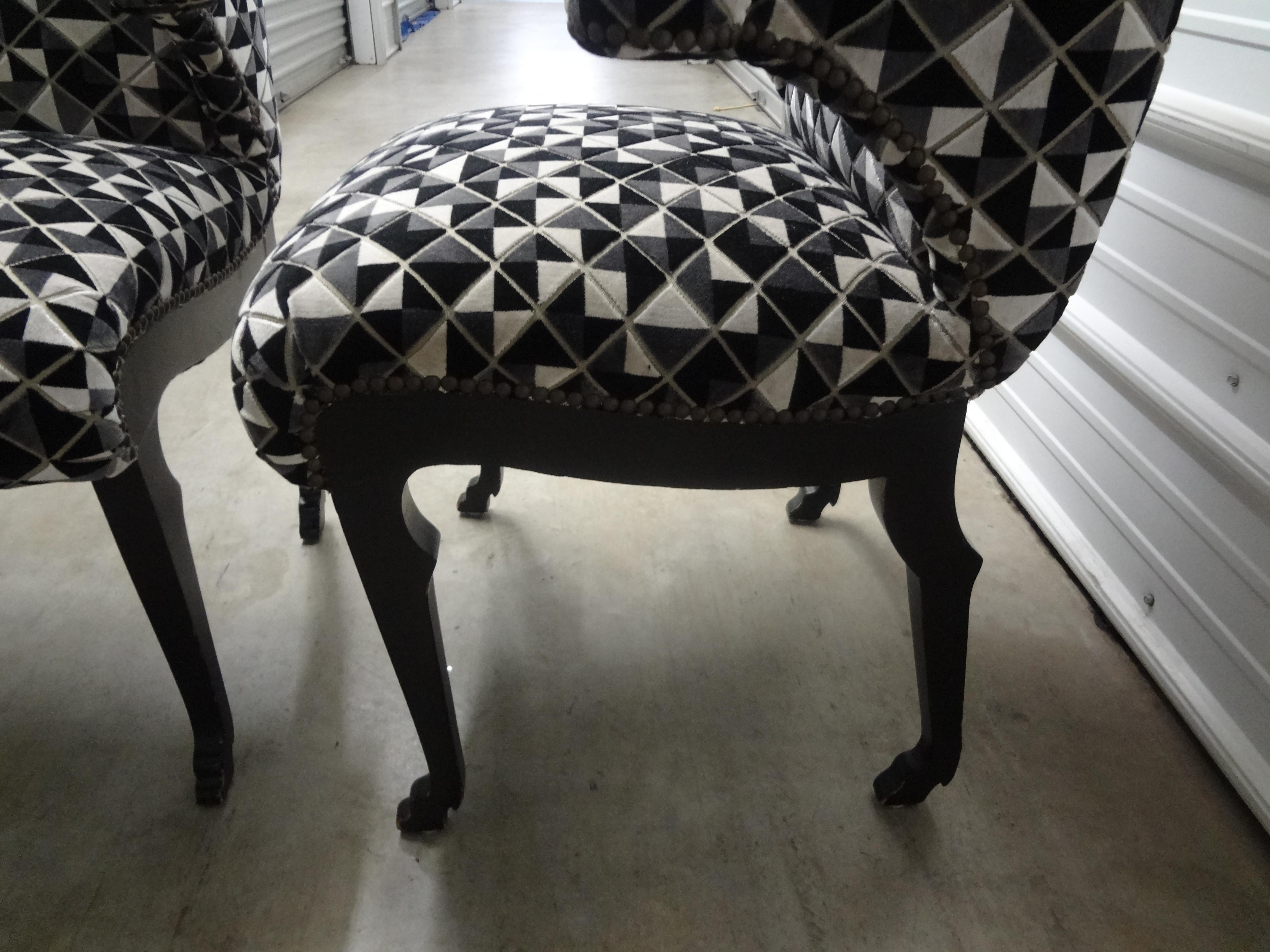 Pair of Grosfeld House Etruscan Style Ebonized Lounge Chairs with Hoof Feet In Good Condition For Sale In Houston, TX