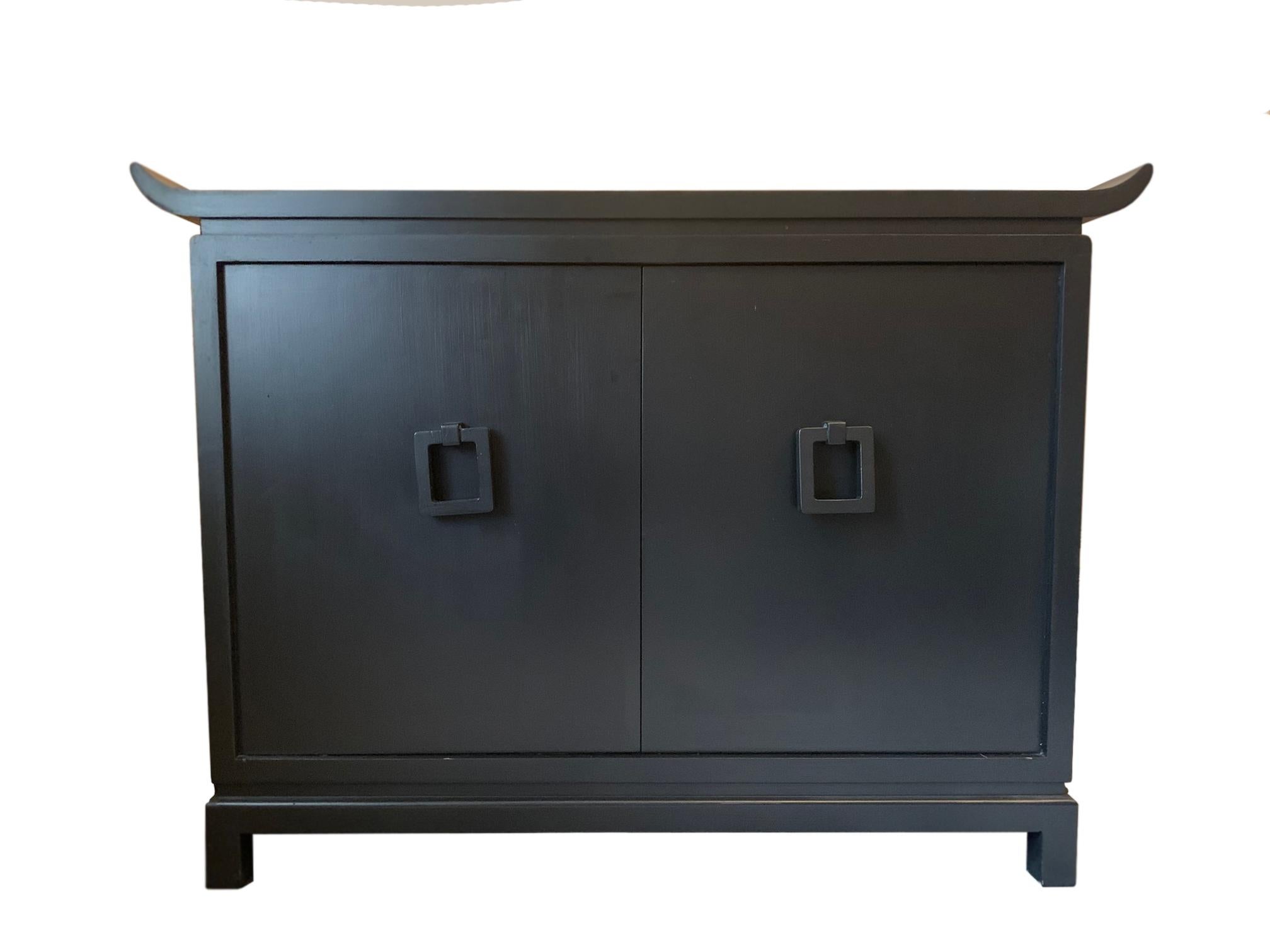 James Mont Hollywood Regency Cabinets 

A pair of classic James Mont pagoda style cabinets circa 1950s 

Created with finest Mahogany, and adorned  with the classic James Mont chinoiserie style detailing and form.

The interior of cabinets are