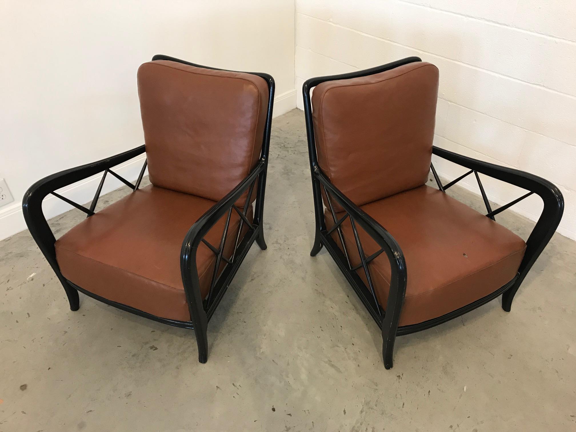 Pristine pair of black lacquered James Mont low chairs with mohair.