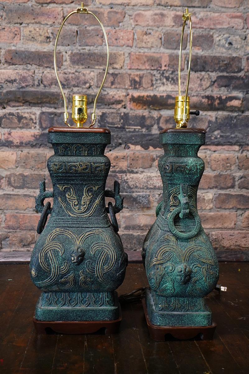 Américain Pair of James Mont Style Archaic Patinated Bronze Table Lamps en vente