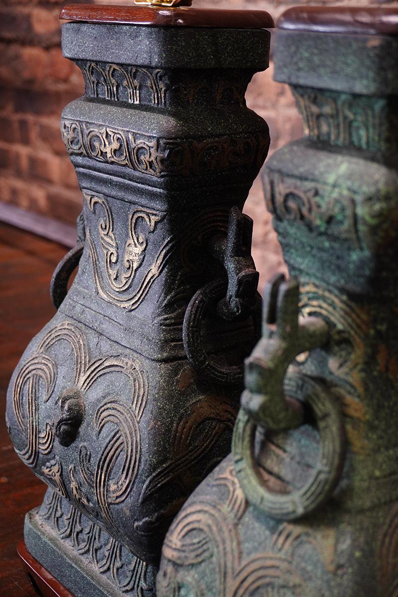 Milieu du XXe siècle Pair of James Mont Style Archaic Patinated Bronze Table Lamps en vente