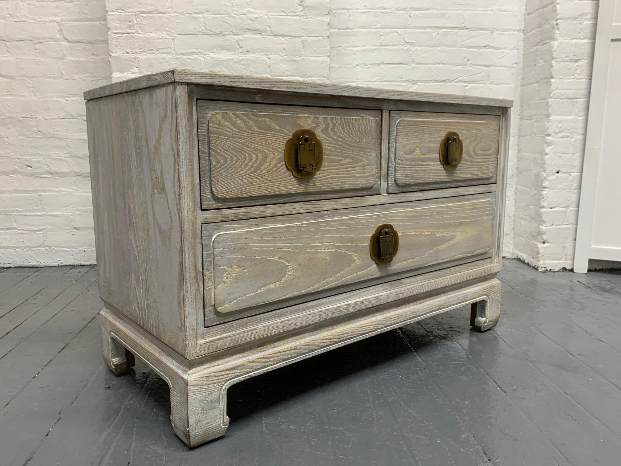 Pair of limed oak finish / cerused oak chests. Can also be used a nightstands. Has original brass handles. Pierre Jeanneret attributed. James Mont Style.