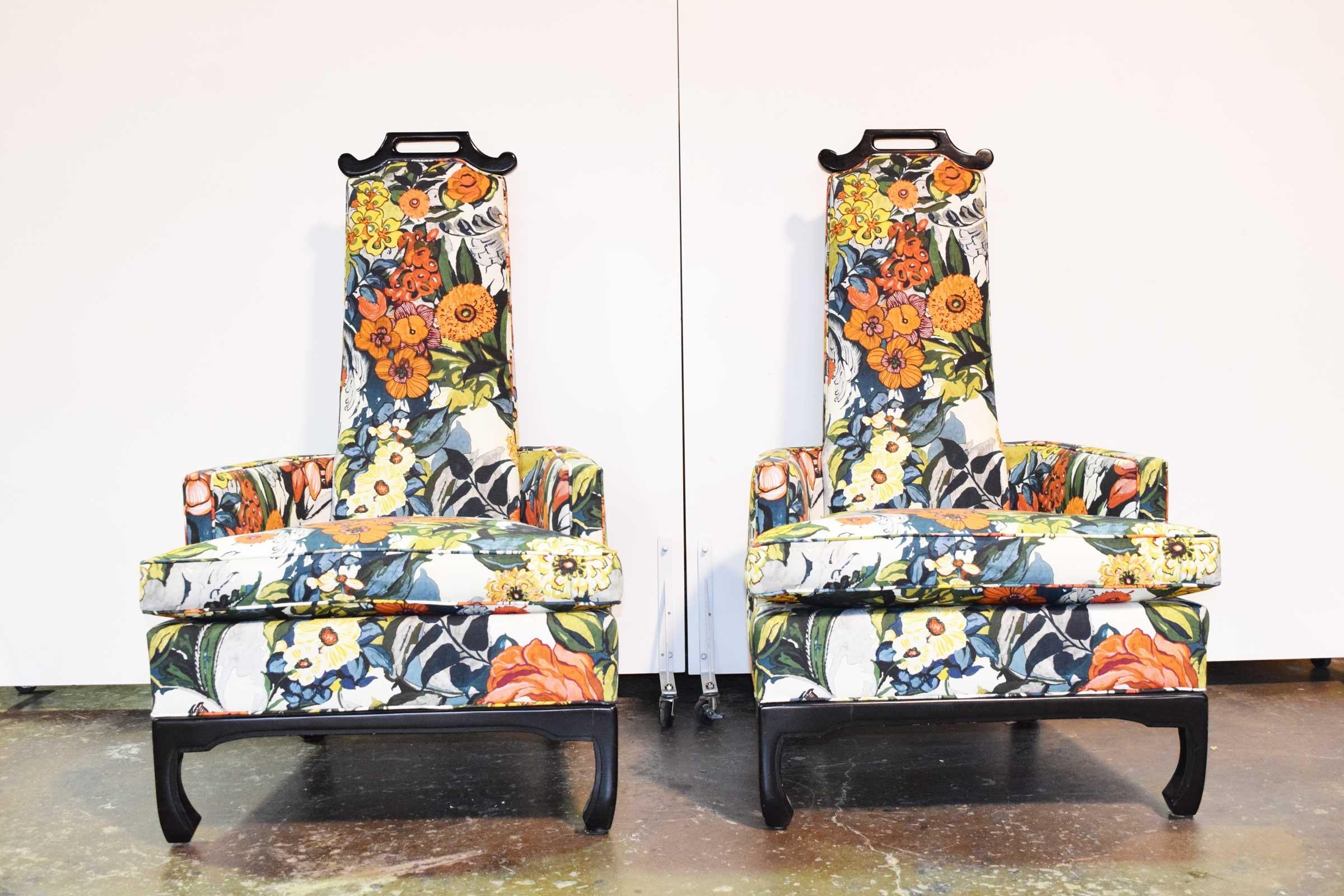 Reupholstered in a vibrant upholstery, Asian style chairs with ebonized finish by Henredon.