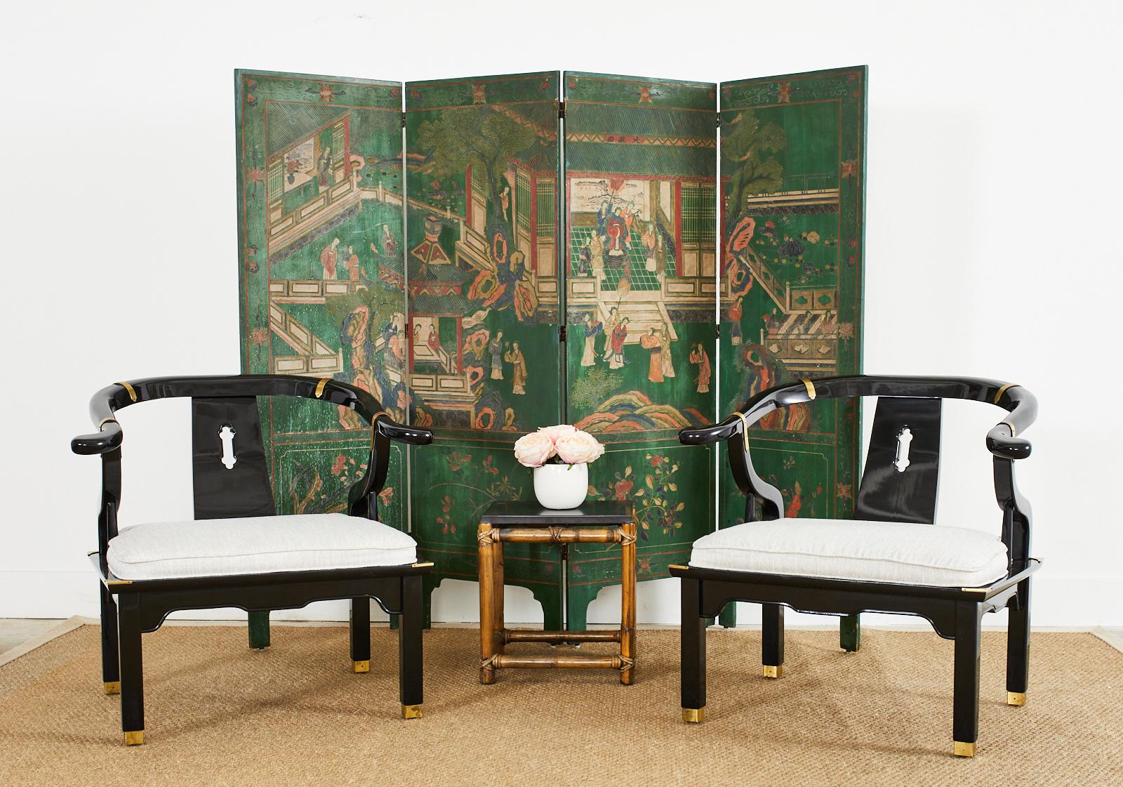 Opulent pair of large Chinese ming style horseshoe lounge chairs made by Century. Originally designed by James Mont these chairs epitomize his over the top dramatic mid-century modern style with an Asian flare. Hardwood frames coated with thick