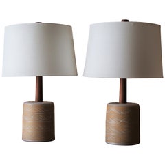 Pair of Jane and Gordon Martz Lamps with Tan and White Incised Design