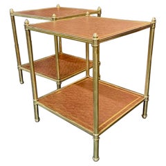 Coppia di tavolini in pelle e ottone di stile Jansen