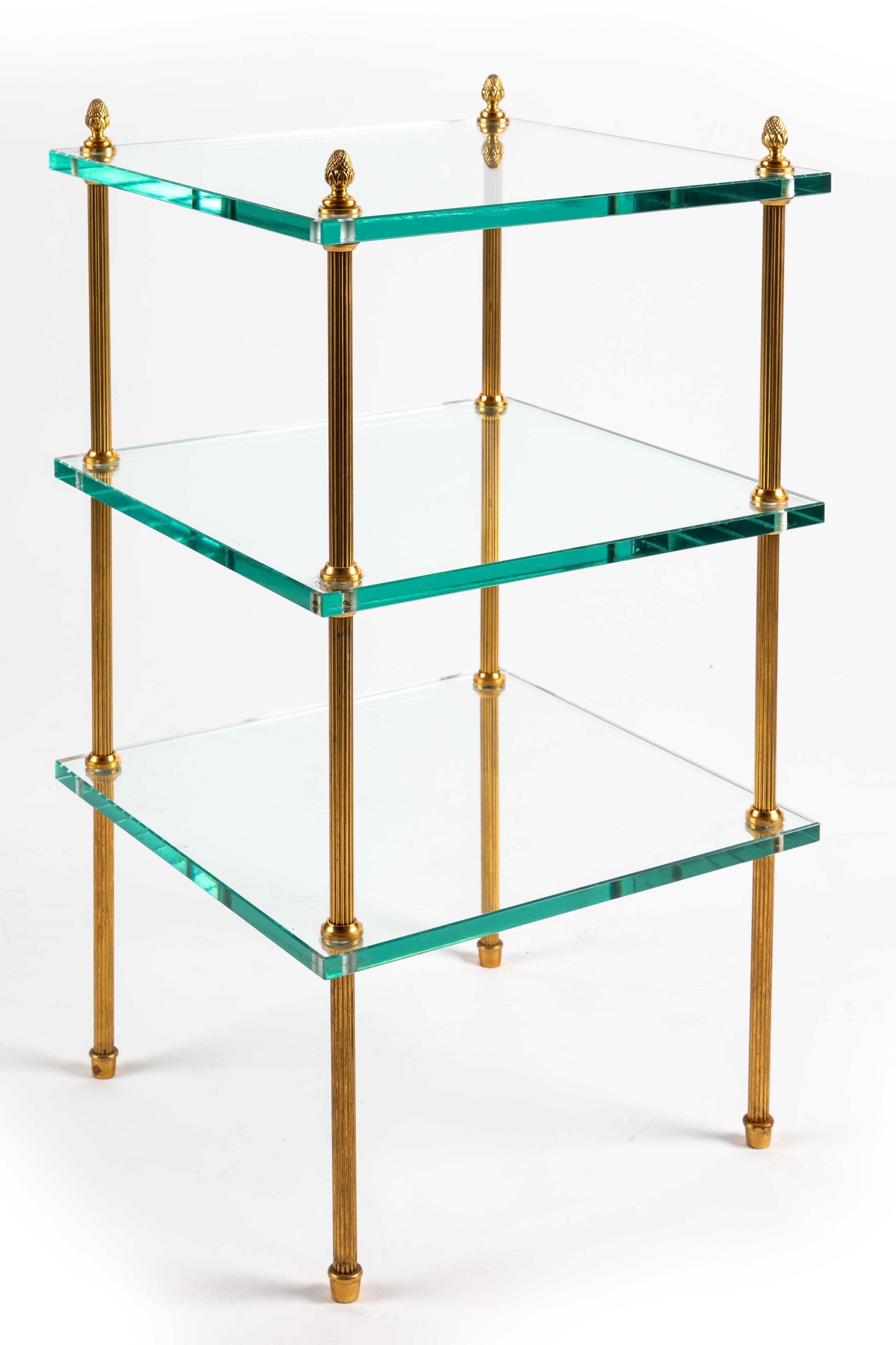 20ième siècle Pair of Jansen Style Gilt Bronze and Glass Triple Tier Side Tables en vente