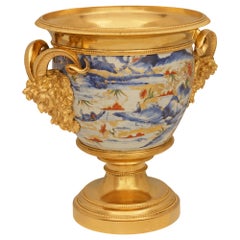 pair of Japanese 18th century Imari Porcelain and French Ormolu mounted urns