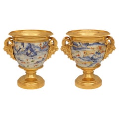 pair of Japanese 18th century Imari Porcelain and French Ormolu mounted urns