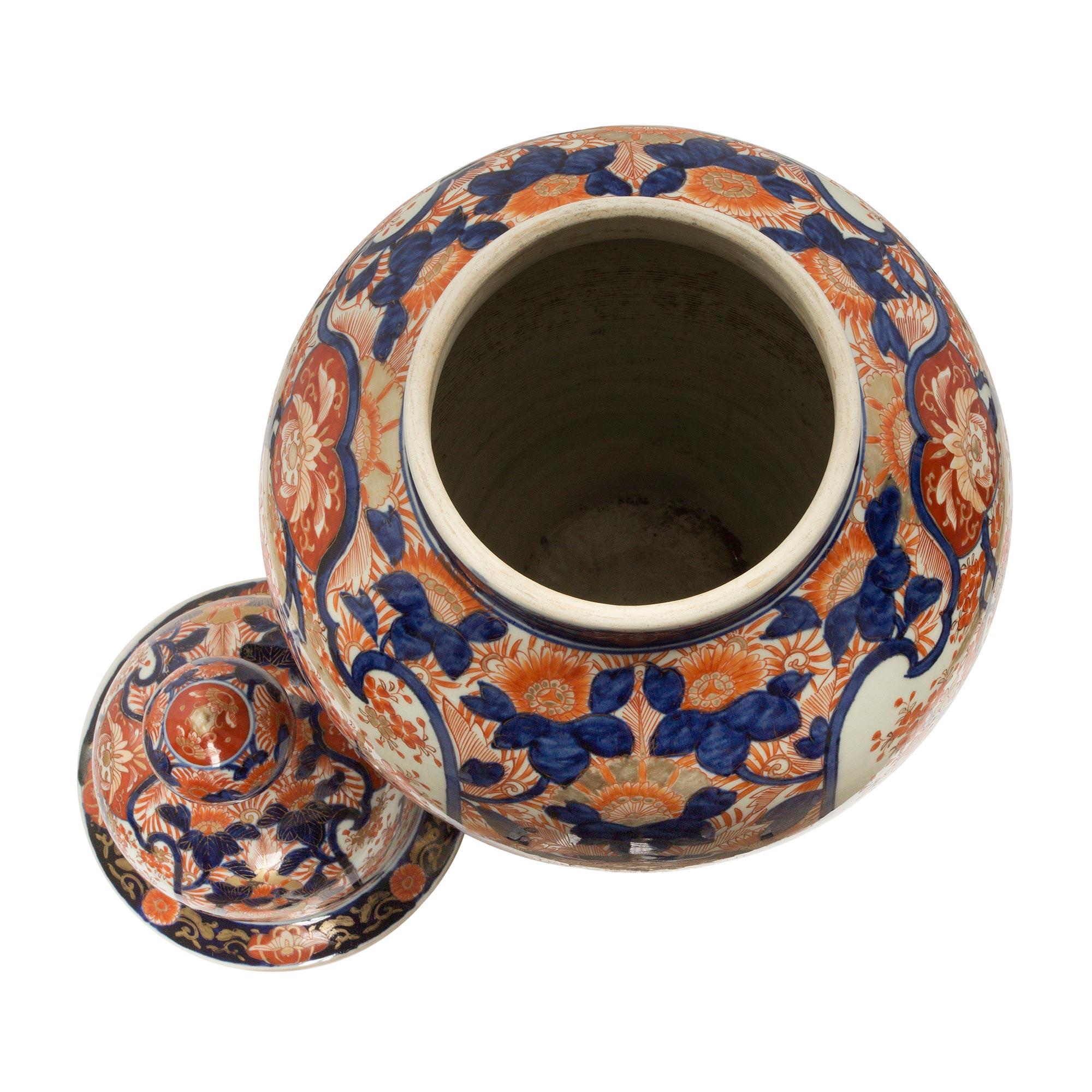 Porcelain Pair of Japanese 19th Century Imari Lidded Urns For Sale