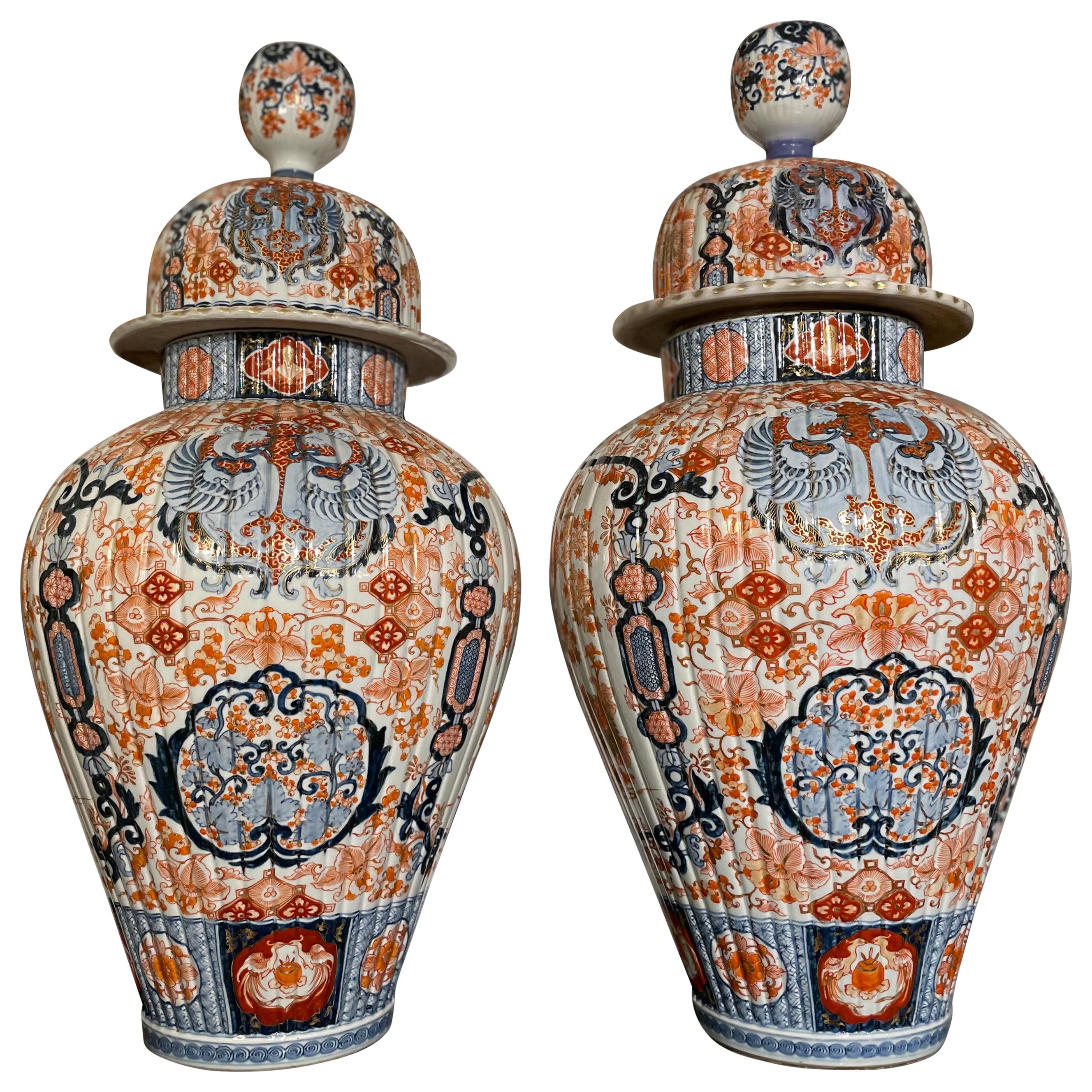 Pair of Japanese 19th Century Imari Lidded Urns For Sale
