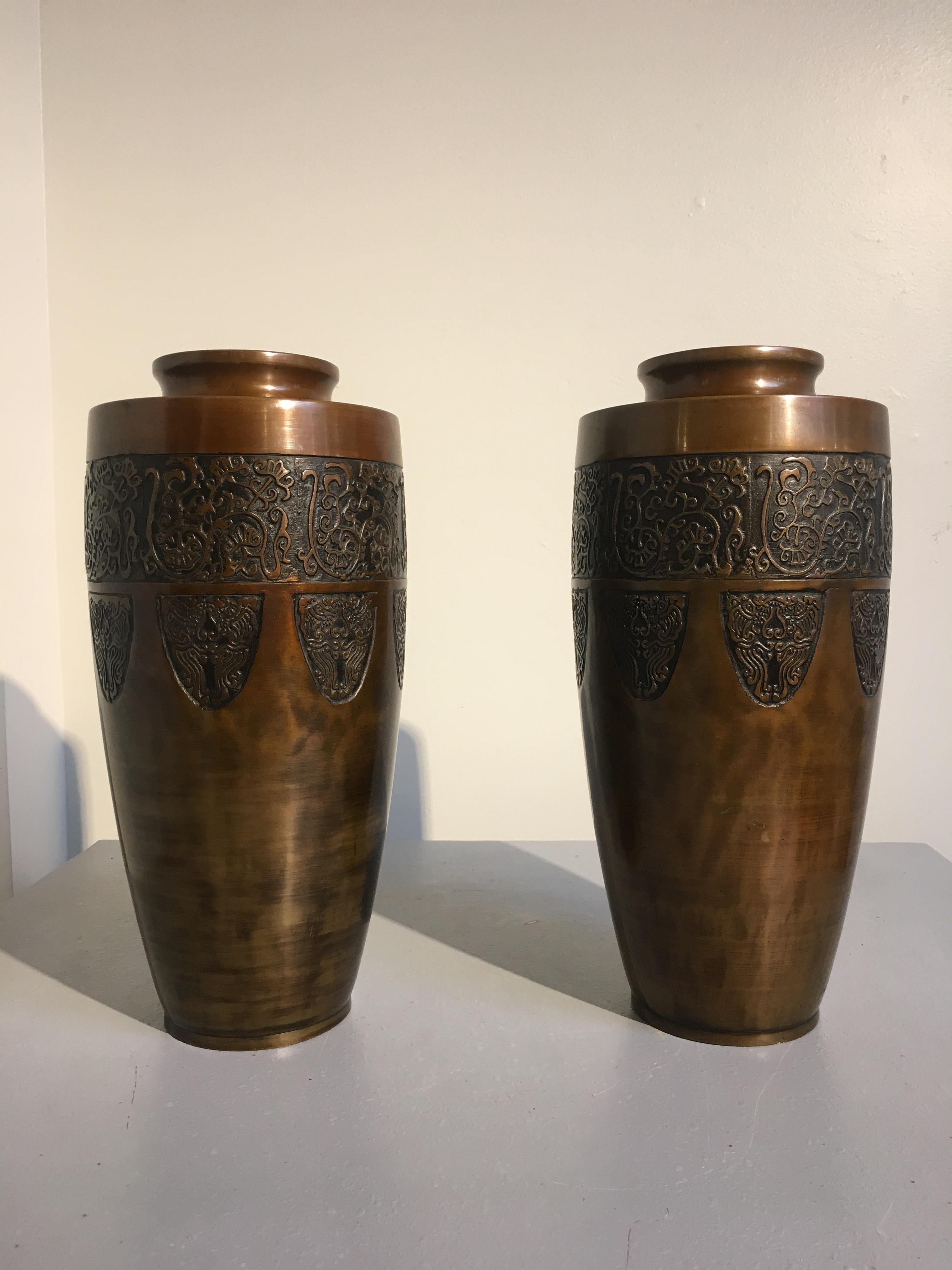Cast Pair of Japanese Art Deco Patinated Bronze Vases with Archaistic Motifs