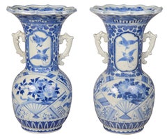 Pair of Japanese Blue and White twin handle lamps / vases, circa 1900