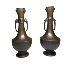 Pair of Japanese Bronze Genie Bottles