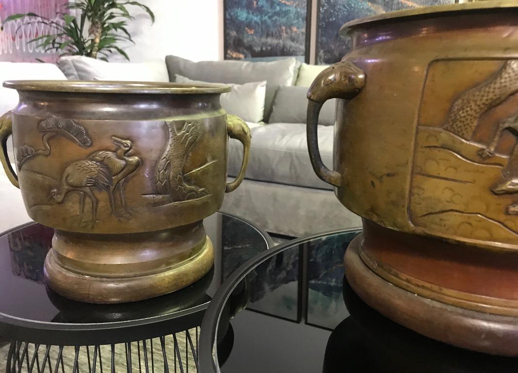 A gorgeous set of bronze Japanese planters with dear, crane and forest motifs.

Likely from Showa Period but possibly Meiji Period.

From a collection of Japanese art and artifacts.

Would be a great addition to any collection. Sure to stand