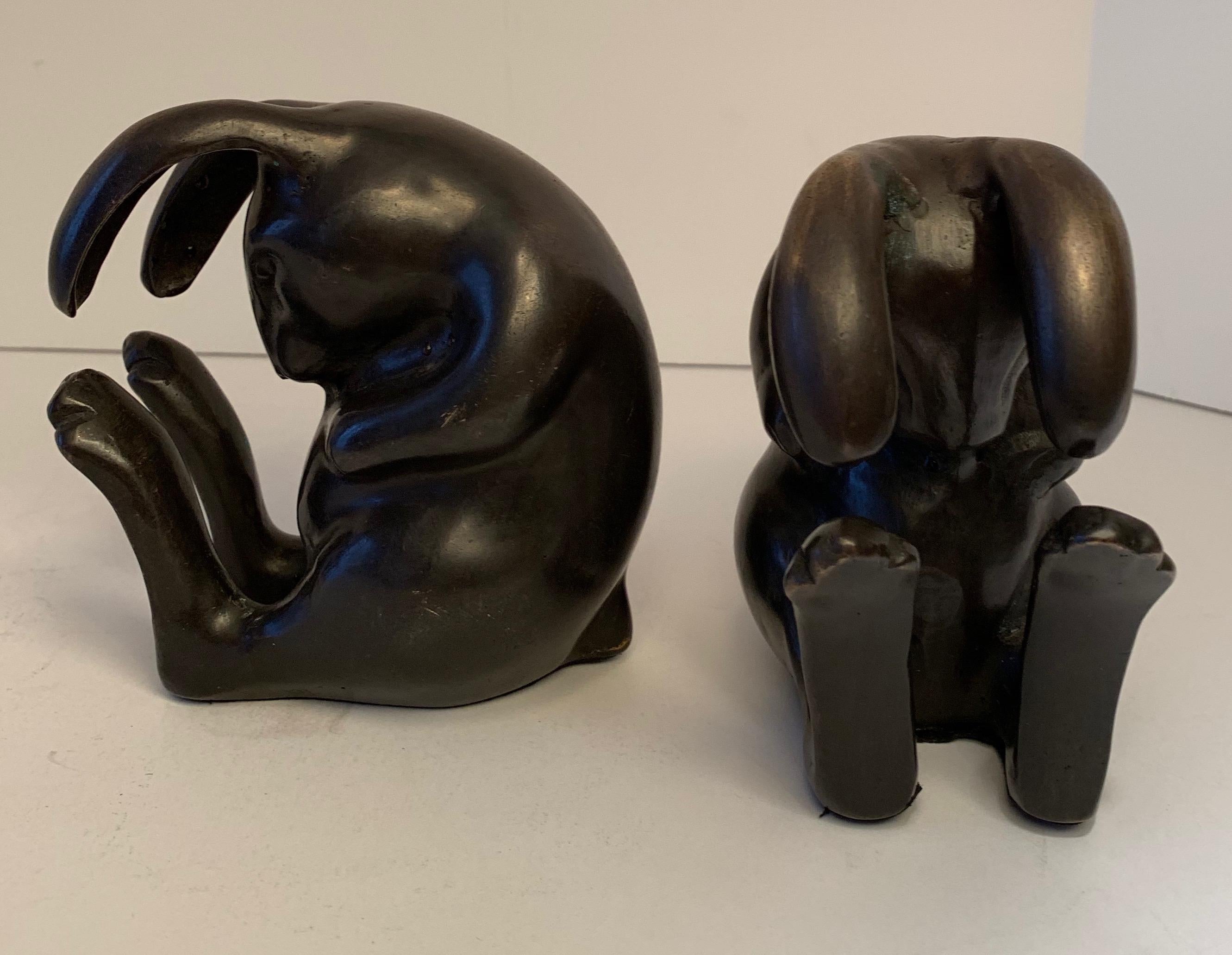 Pair of Japanese style bronze rabbit bookends - a beautiful pair of artfully designed rabbit, or bunny bookends. Perfectly suited for the most artistic of shelves and particularly wonderful in a childs bedroom or playroom.