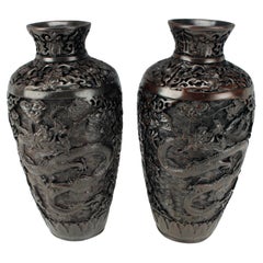 Pair of Japanese Carved Metal Dragon Vases