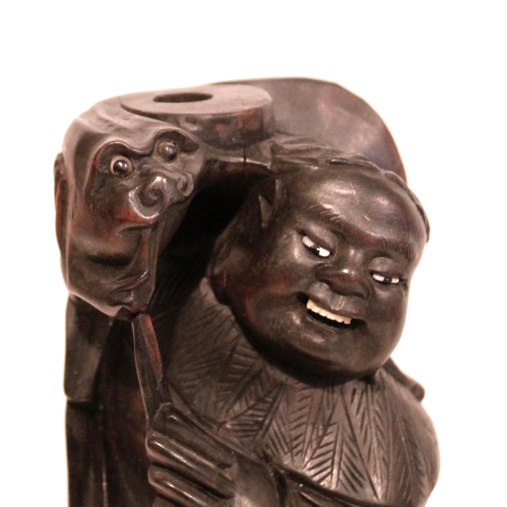 Sculpté à la main Paire de chandeliers de pêcheurs japonais sculptés en bois dur ou de supports de bâtons Joss en vente