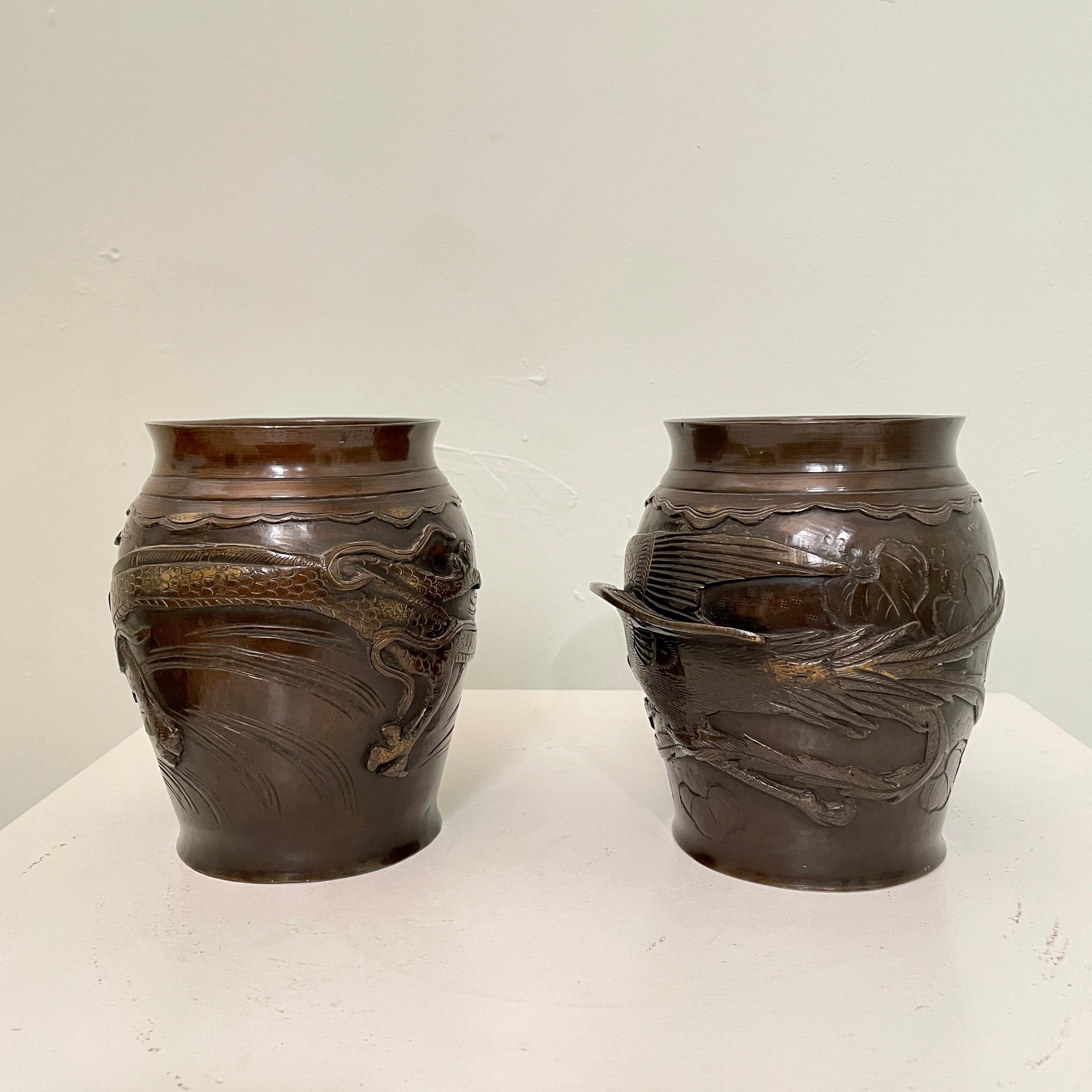 Meiji Pair of Japanese Cast Bronze Vases with High Relief Dragon and Bird Figure, 1900