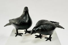 Ein Paar japanischer Vogelskulpturen aus Gusseisen, um die 1950er Jahre