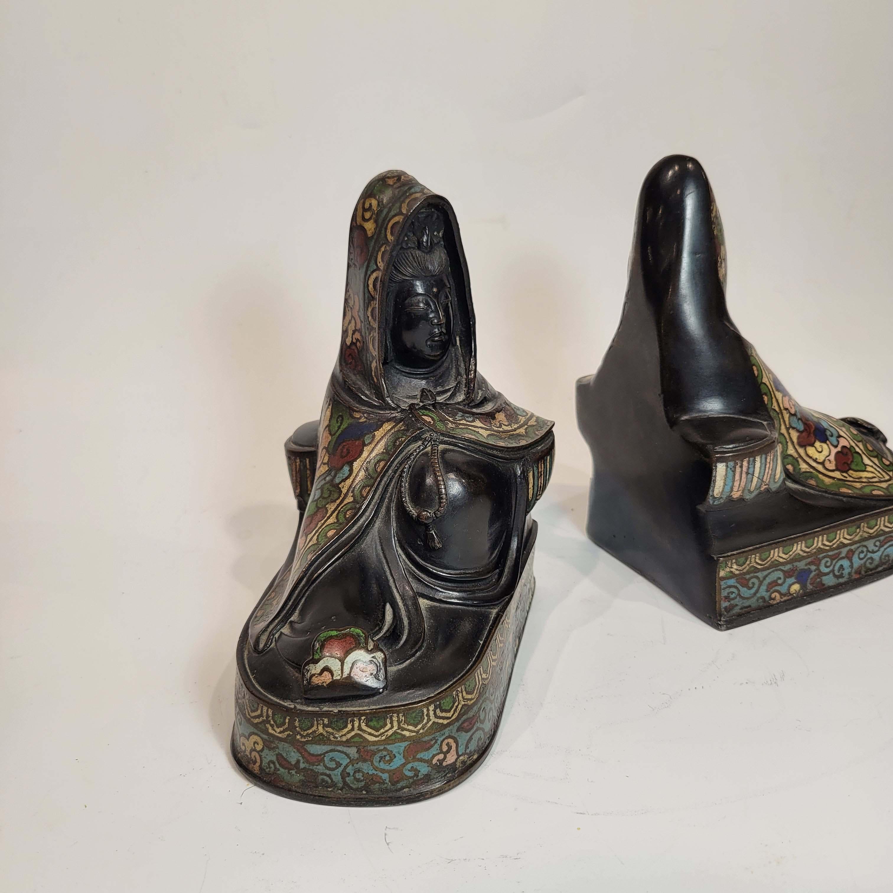 Rare pair of Japanese Clisonne and patinated Bronze Buudha bookends, Meiji period, late 19th, early 20th century.
Each beautifully cast and with excuisite details.
The Meiji Period in Japan (1868-1912).