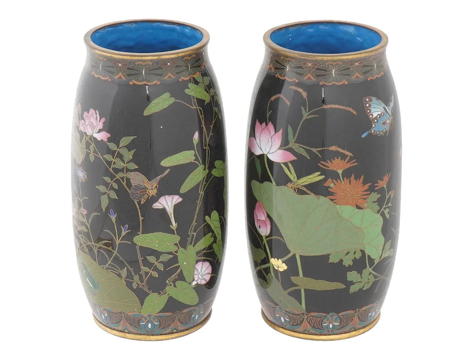 A beautiful pair of Japanese cloisonne enamel vases from the school of Goto Seizaburo, Meiji period circa 1890.



Each vase is decorated on a rich black ground with an elegant lotus pond scene filled with naturalistic detail. Large lotus leaves and