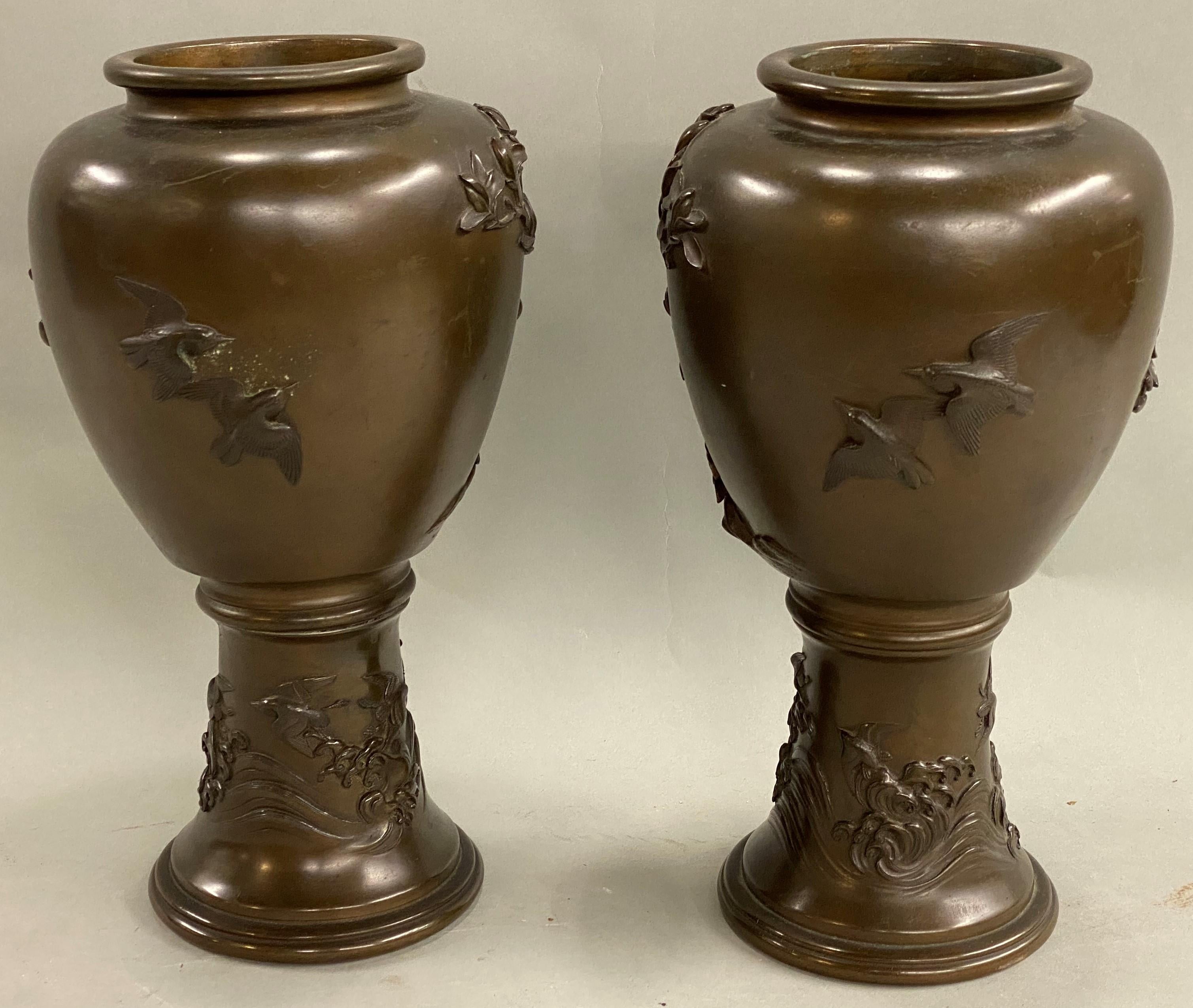 Patinated Pair of Japanese Edo Period Foliate and Bird Relief Decorated Bronze Vases For Sale