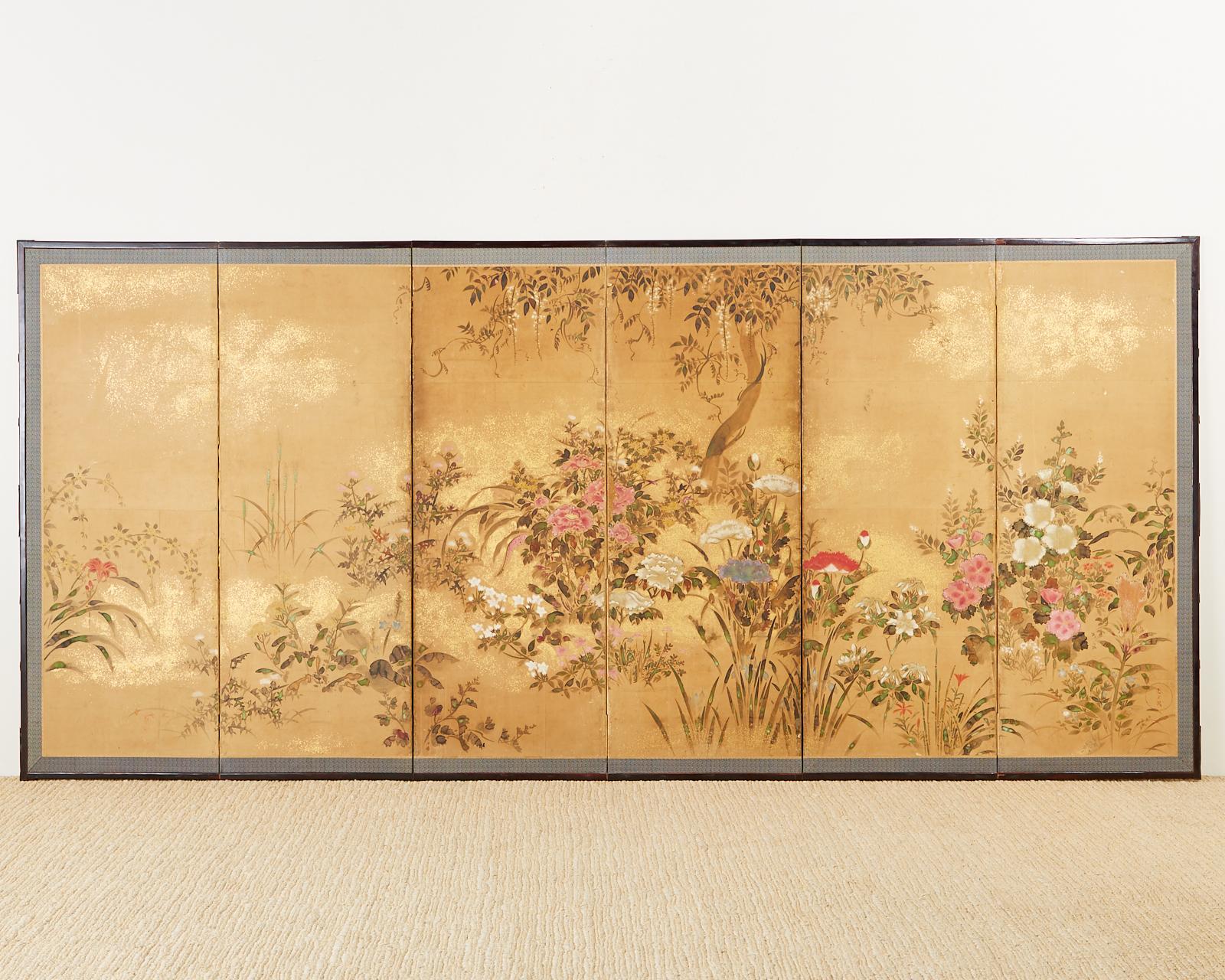 Impressive pair of 17th century Japanese Edo period Rinpa school screens made in the manner and style of Autumn Grasses by Tawaraya Sotatsu (1570-1640). Beautifully decorated with wild flowers and grasses. Ink on paper with gold flecks set in