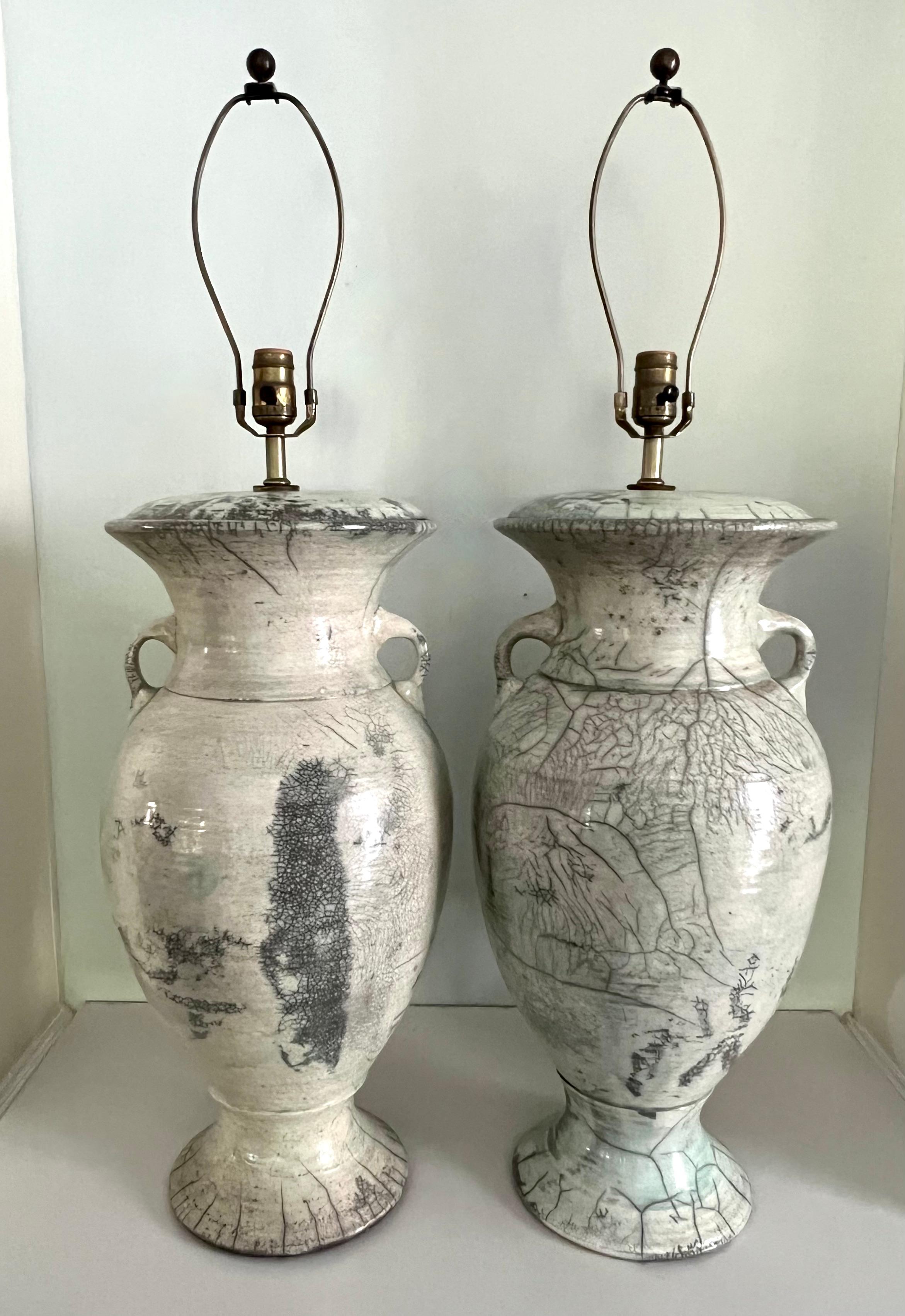 A phenmonal Pair of Japanese Raku Table Lamps. The urns have a 