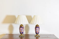 Paar japanische Tischlampen aus Imari Porcelain und vergoldetem Messing, Anfang 20.