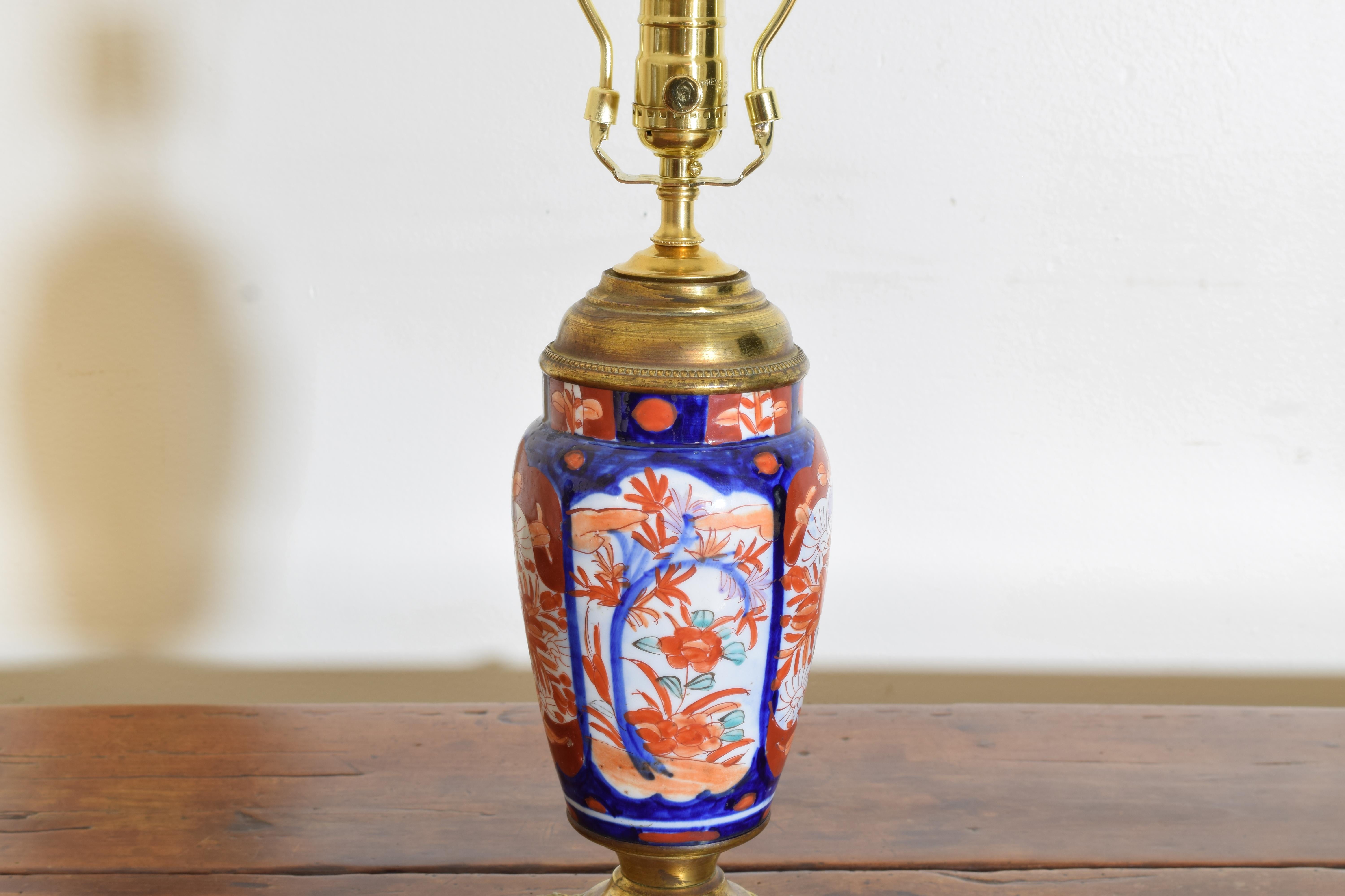 Pair of Japanese Imari Porcelain and Gilt Brass Table Lamps, early 20th C. For Sale 1