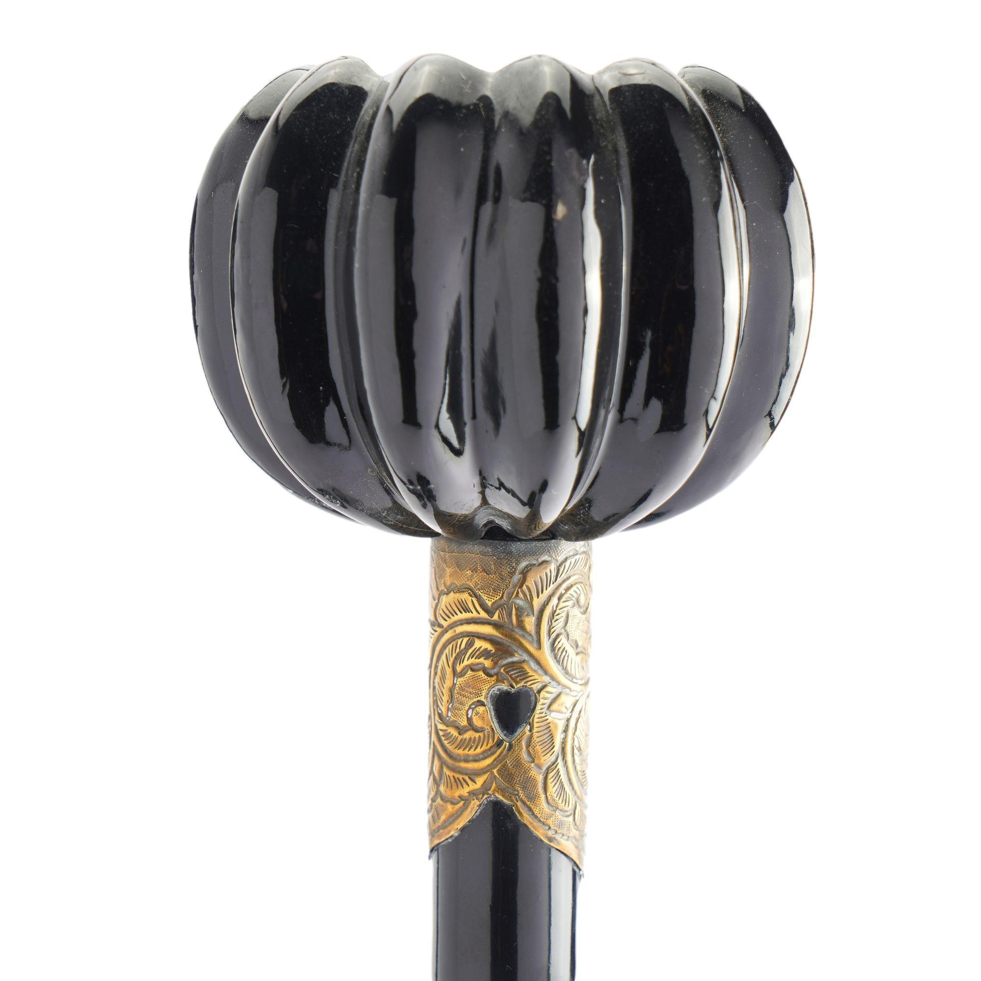 Brass Pair of Japanese lacquered wood altar sticks, 1850-1900