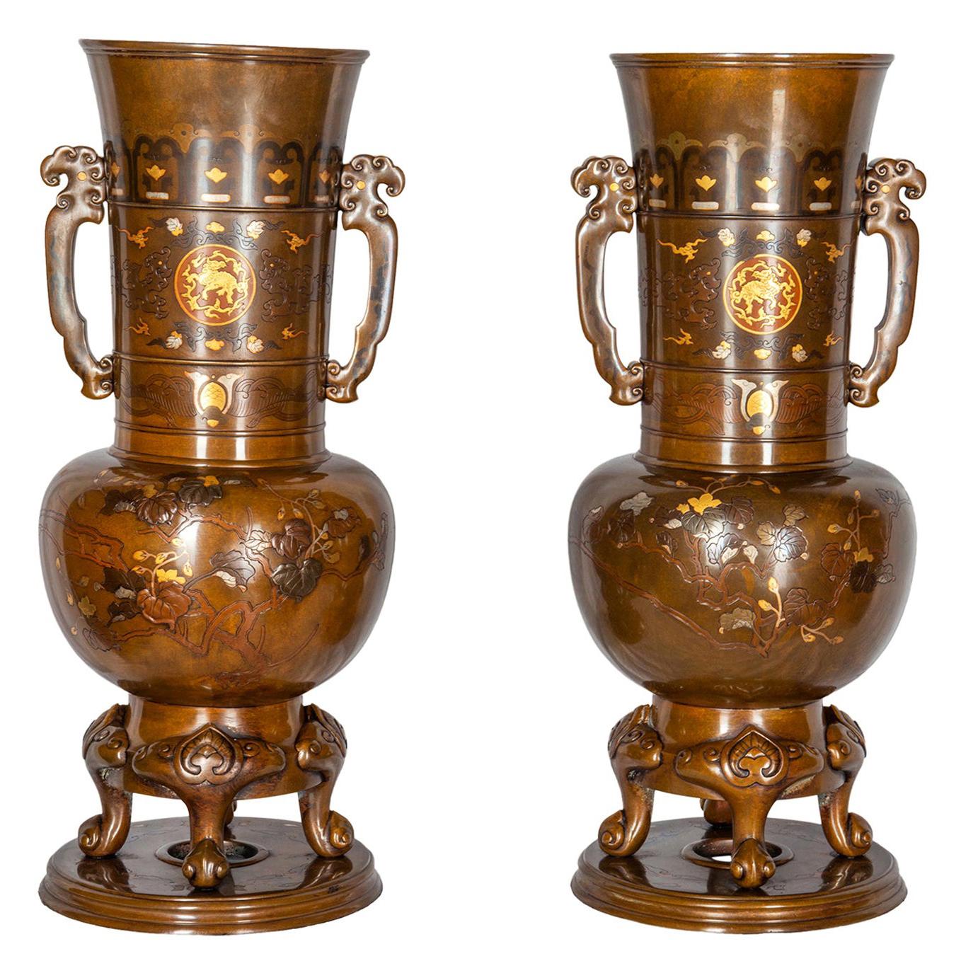 Pair of Japanese Meiji Period Bronze and Gilt Vases For Sale