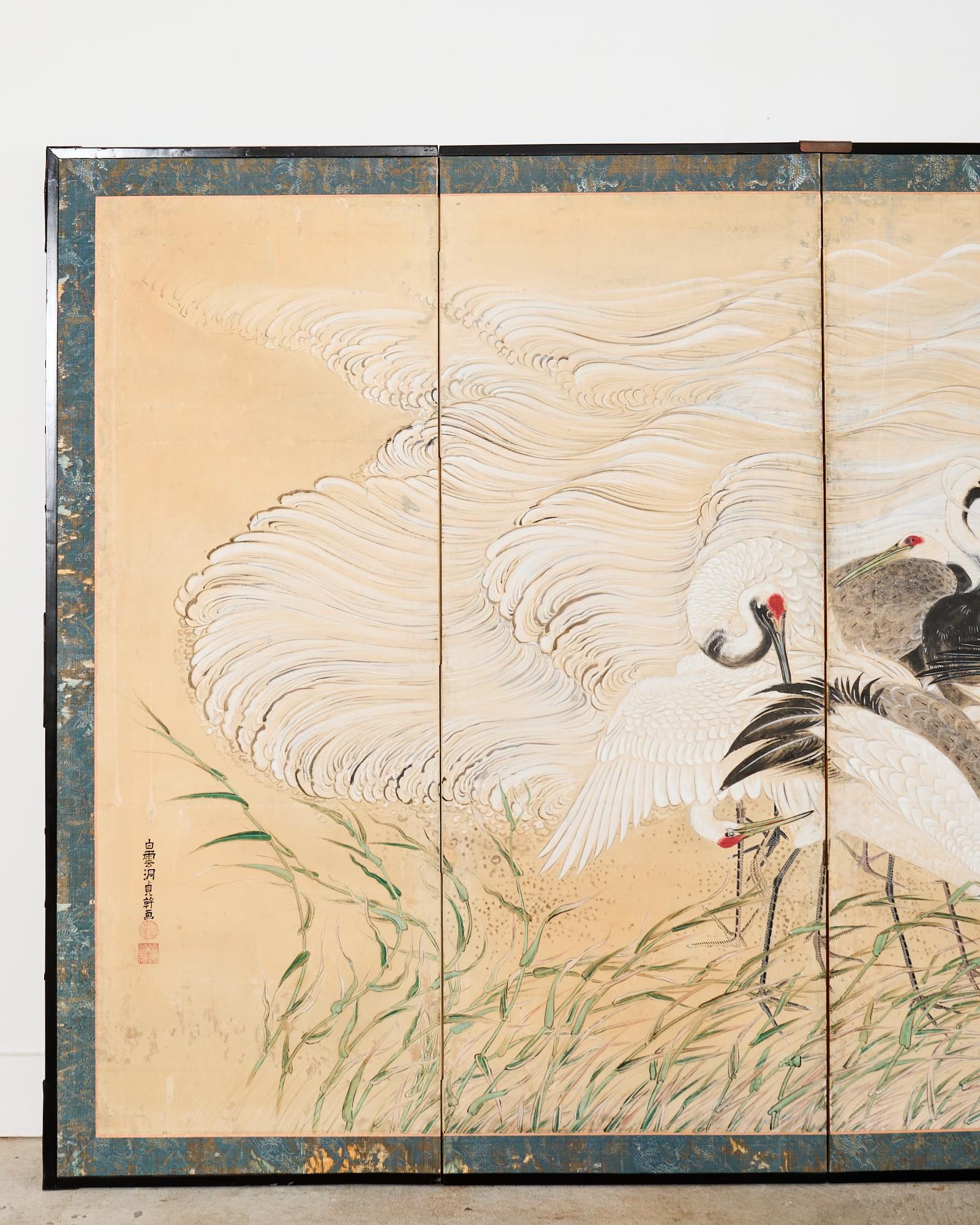 Pair of Japanese Meiji Six Panel Screen Cranes Above Cresting Waves In Distressed Condition For Sale In Rio Vista, CA