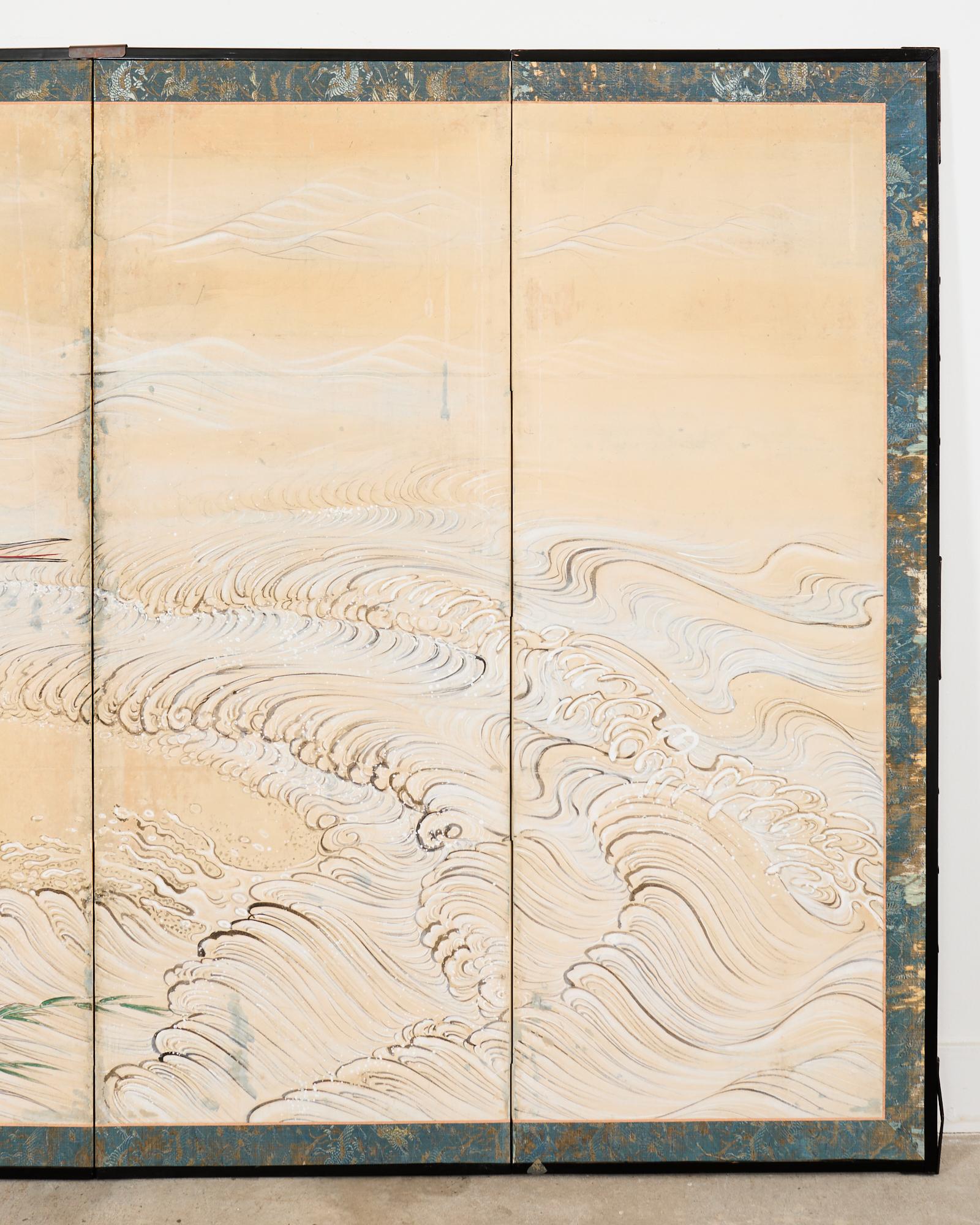 Brass Pair of Japanese Meiji Six Panel Screen Cranes Above Cresting Waves For Sale