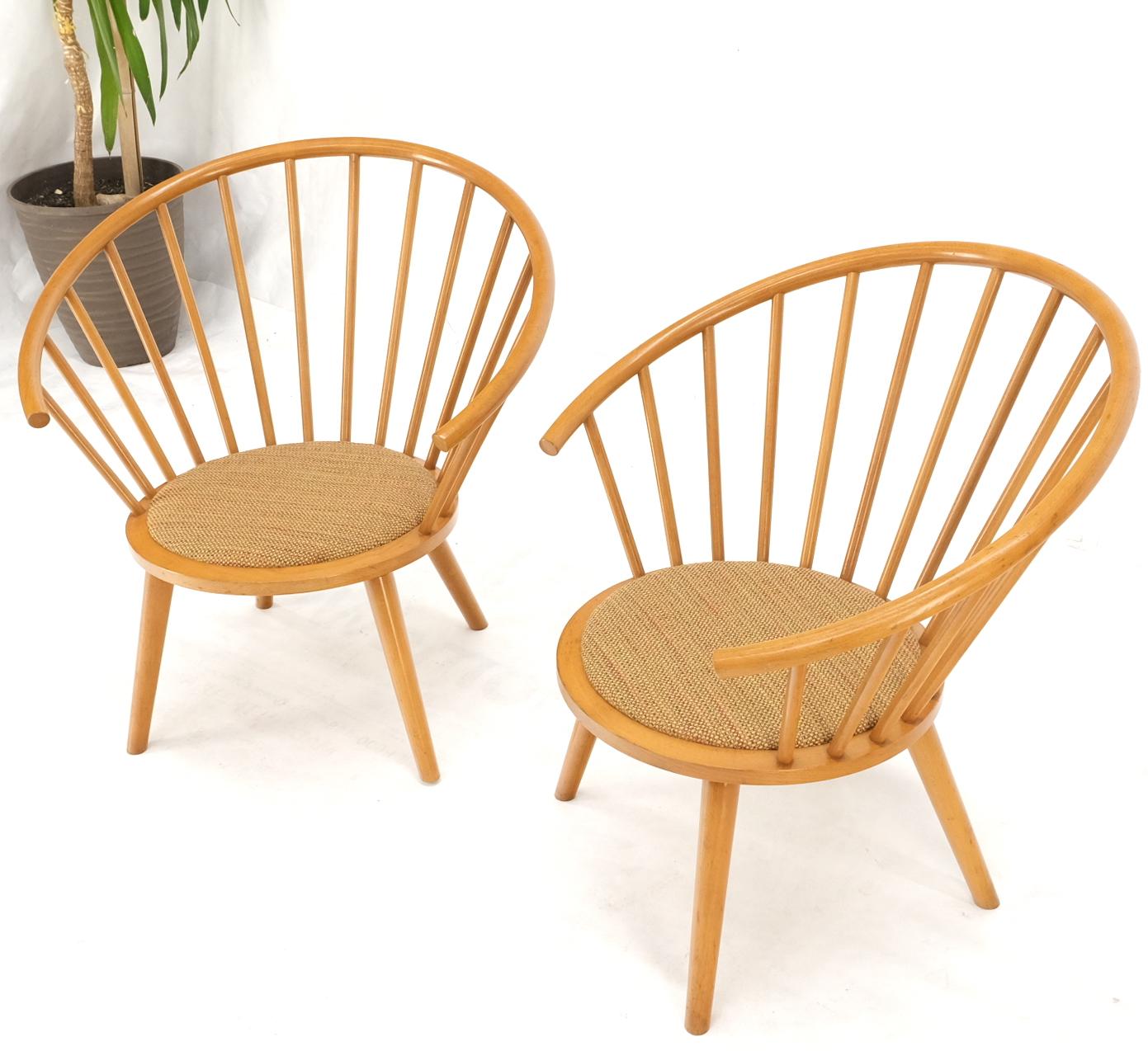 Pair of Japanese Mid Century Modern Akita Mokko fan barrel back lounge chairs.