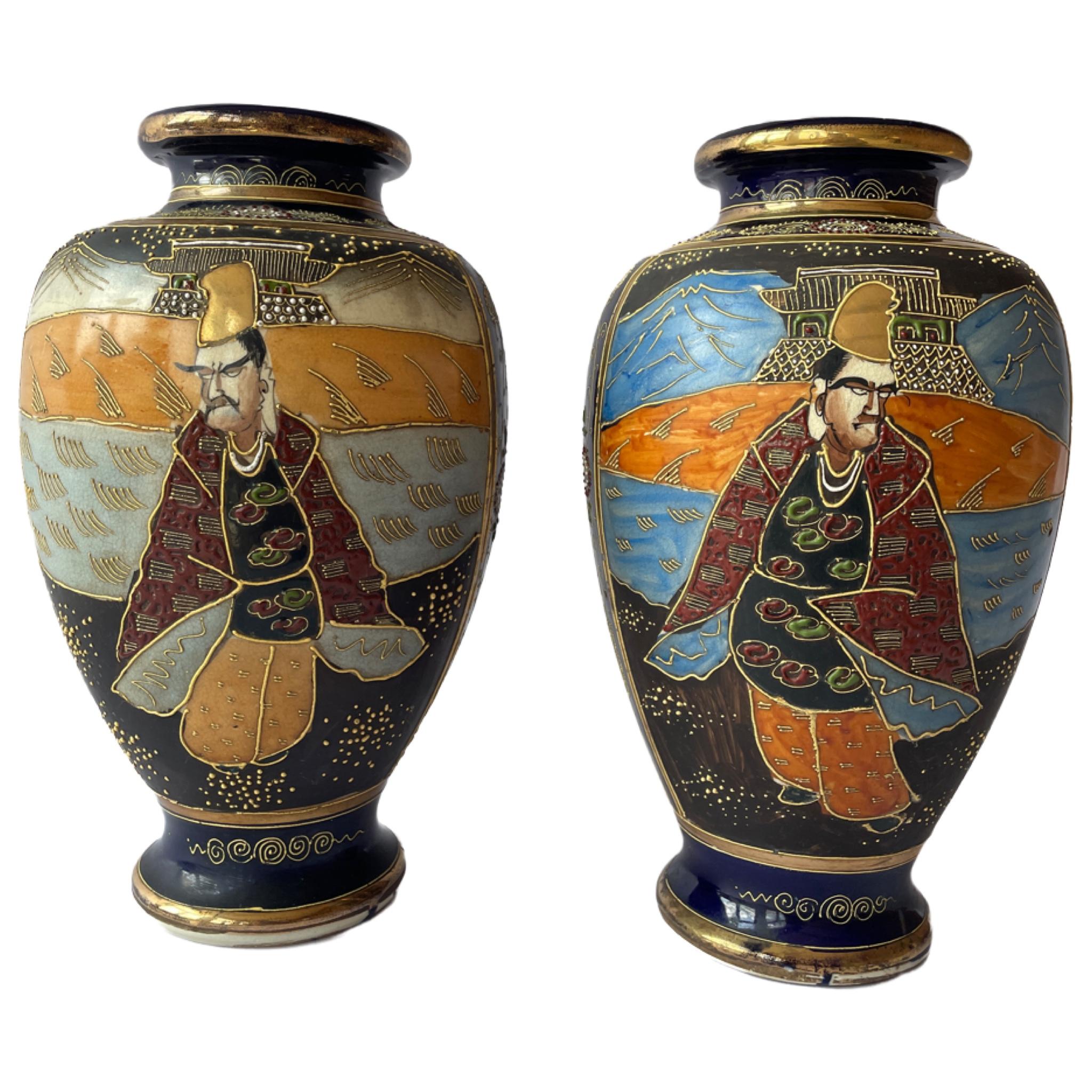 Japanese Satsuma vases from the circa 1930-1940 period are a particular style of ceramic art that originated from the Satsuma province of Japan. Satsuma ware is renowned for its intricate hand-painted designs, rich colors, and distinctive crackled