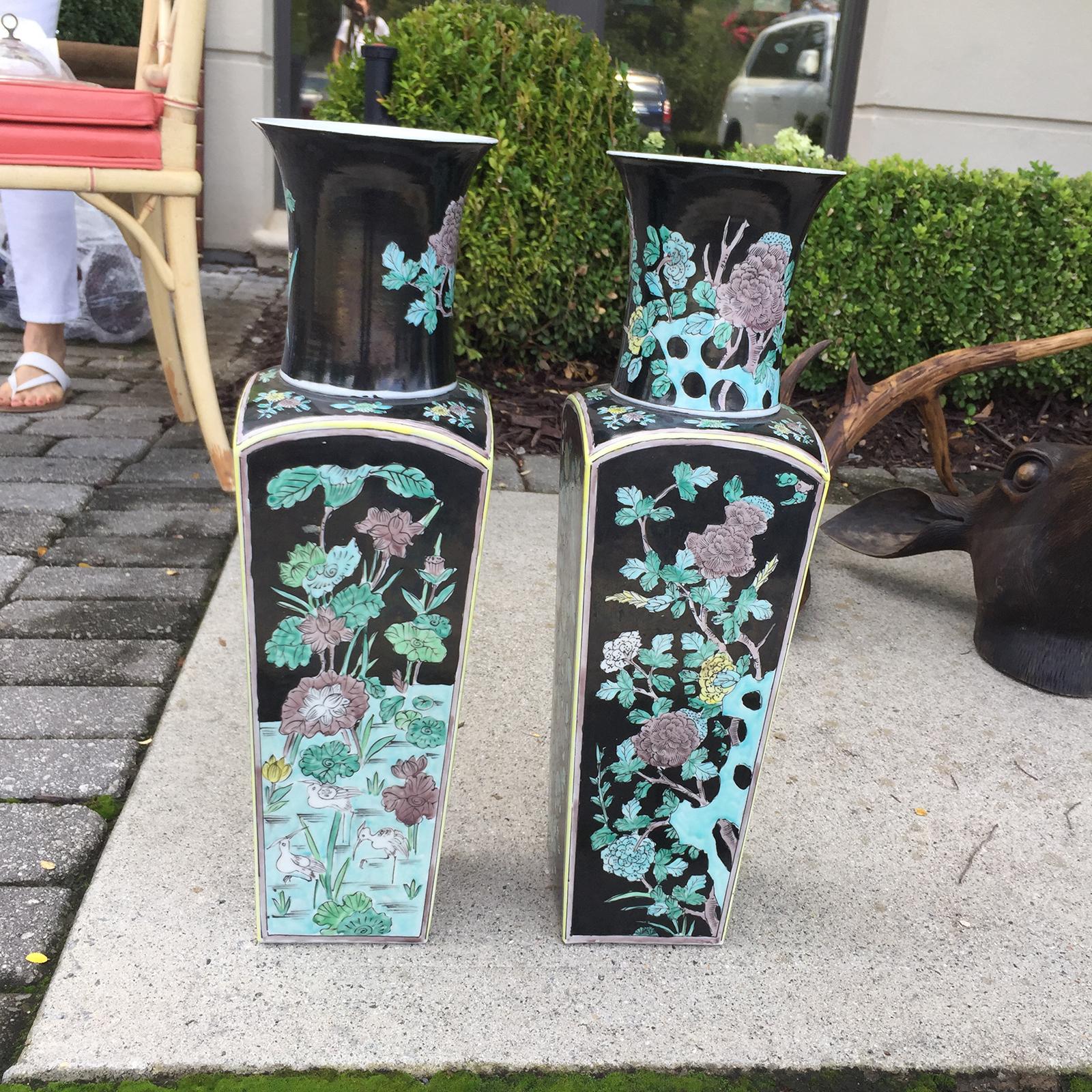 Pair of Japanese Porcelain Famille Noire vases with Japan sticker. Herons or cranes in lotus pond and chrysanthemums or snow willow flowers. Beautiful quality.