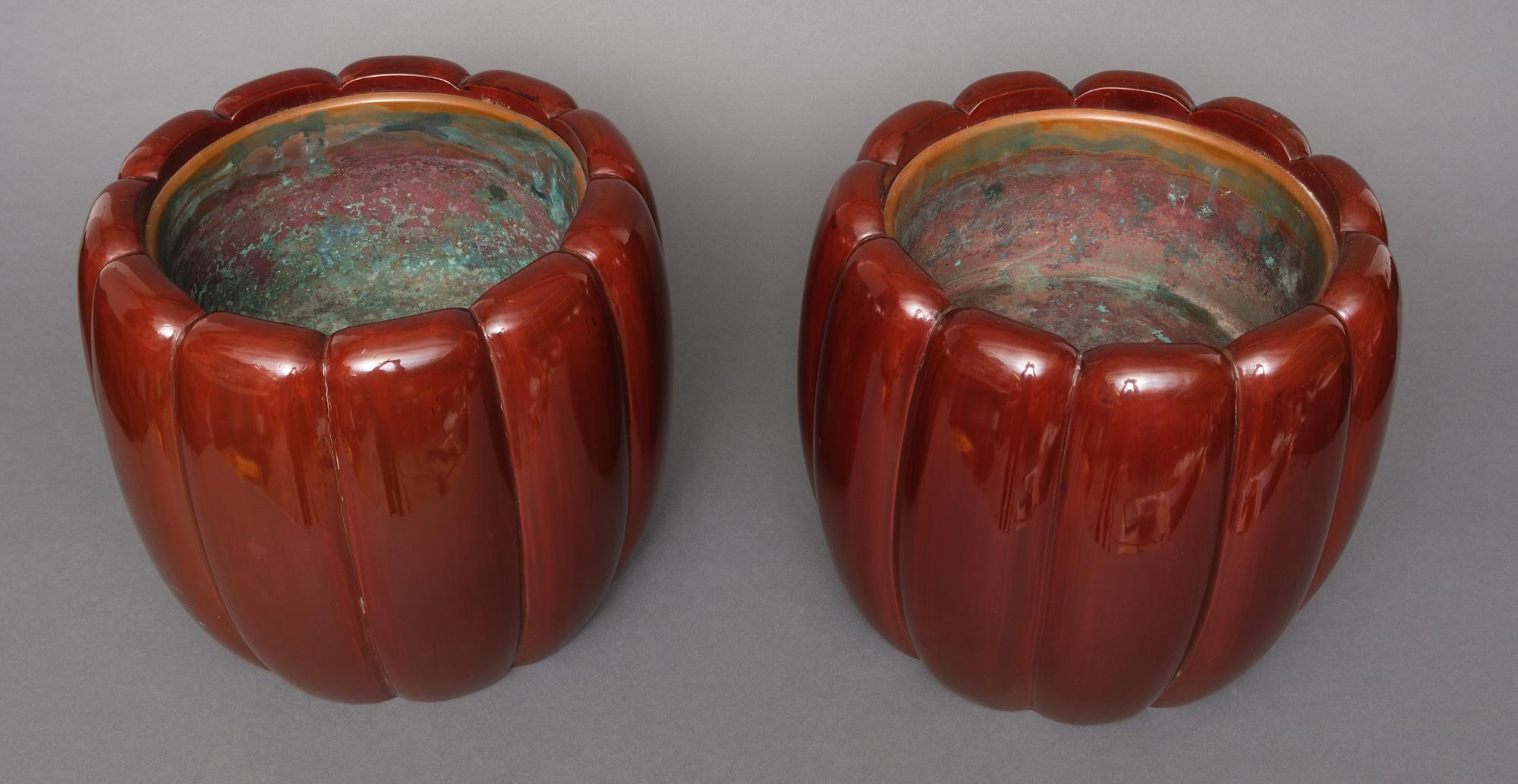 Pair of magnificent hibachi (fire bowls) shaped like chrysanthemum flowers (kiku) and finished with high quality ‘bordeaux red’ lacquer.
Each is carved from a solid piece of wood with fine elegant lobes representing the petals.
The interior fitted