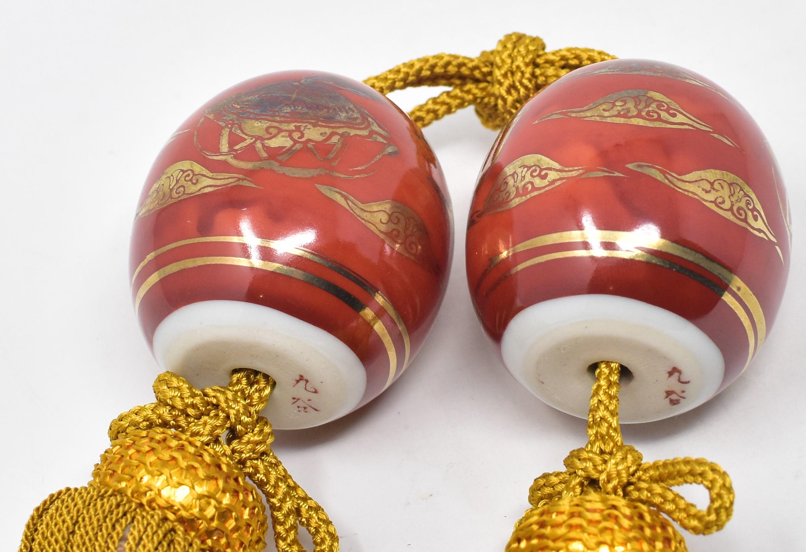 Late 20th Century Pair of Japanese Gold Red Porcelain Scroll Weights, circa 1985
