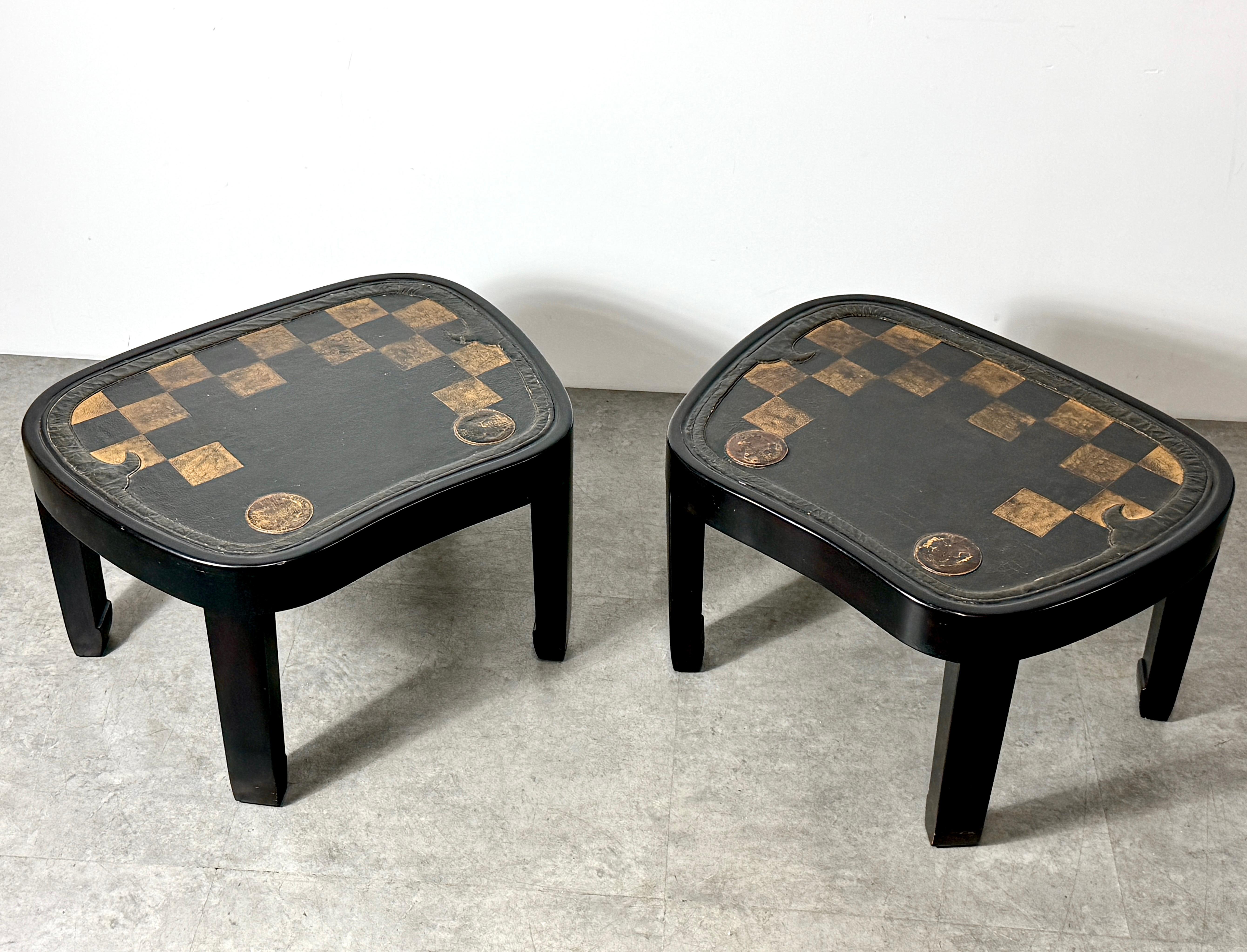 A pair of modern tables made from 18th - 19th Century Japanese saddle flaps (Aori)

Surfaces crafted of inlaid antique Samurai saddle pads in black leather with gold checkerboard decoration

Custom lacquer frames in dark umber by Gracie Studio New