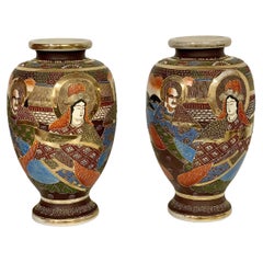 Pair of Japanese Satsuma 'Moriage' Vases with 'Immortals' Design
