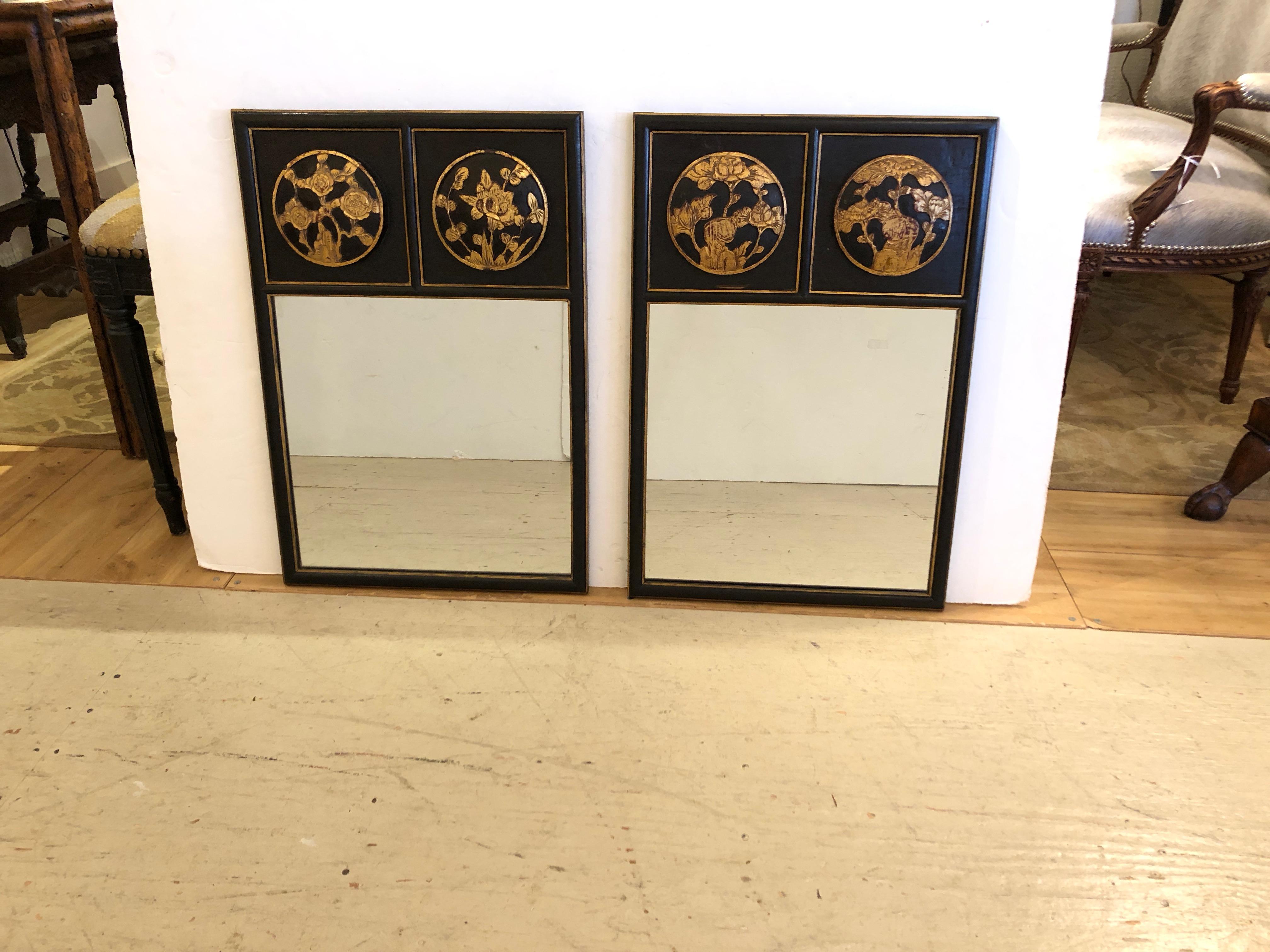 Pair of rich black and gilded Japanese style mirrors having circular decorative medallions at the top, each one unique.
Mirrors measure 15.5 x 15.5.