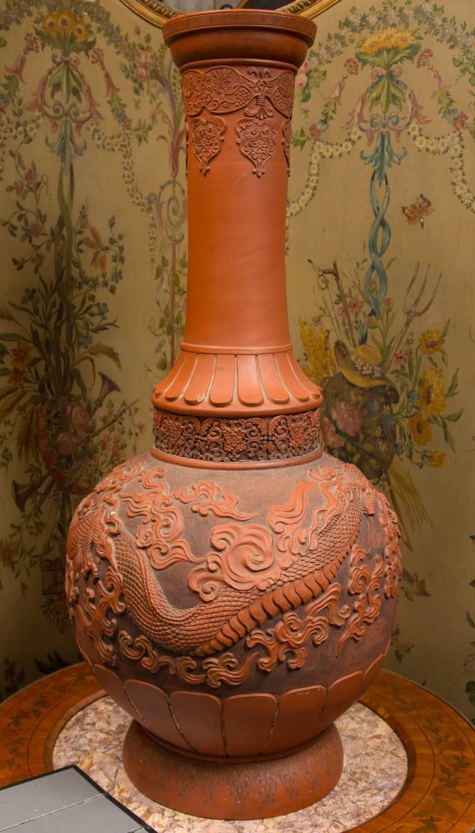 Bulbous bottoms, tall necks. Decorated with dragons, clouds and other Asian motifs.