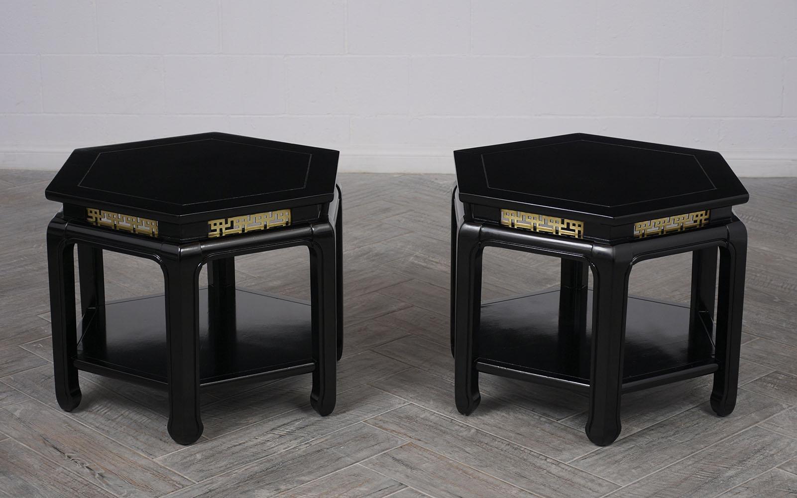 Elegant pair of 20th century hexagon side tables by J.B. Van Sciver Co. They have been newly ebonized. Solid mahogany wood top, followed by brass design decor on all sides, finished with six carved thick legs and a bottom shelve for extra space.
