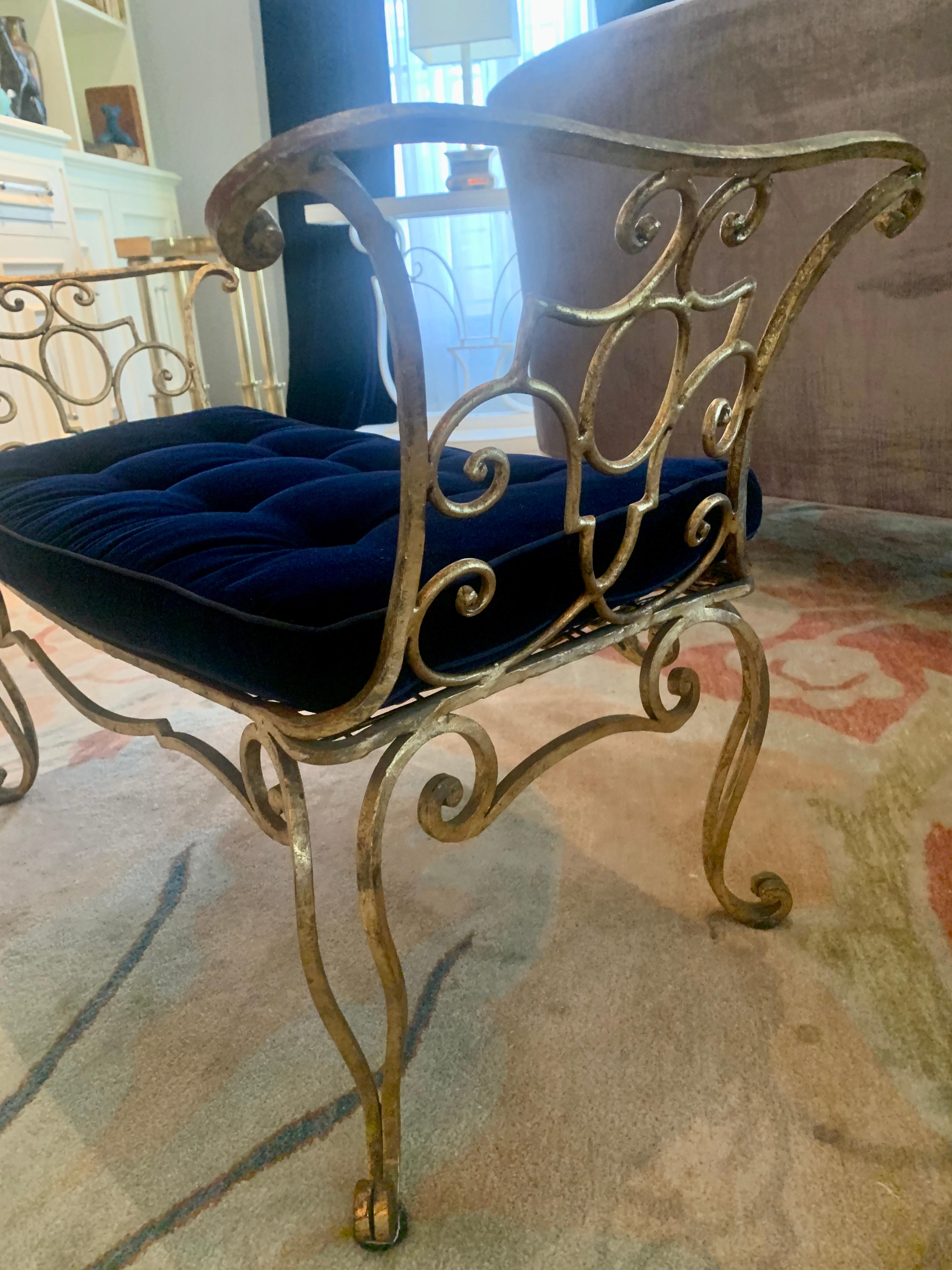 Iconic to intricate wrought iron work, Jean-Charles Moreux is synonymous with the use of hand wrought iron in an elegant and sophisticated twist. The pair of benches are a wonderful compliment to flank a pair of doors or to oppose one another in a